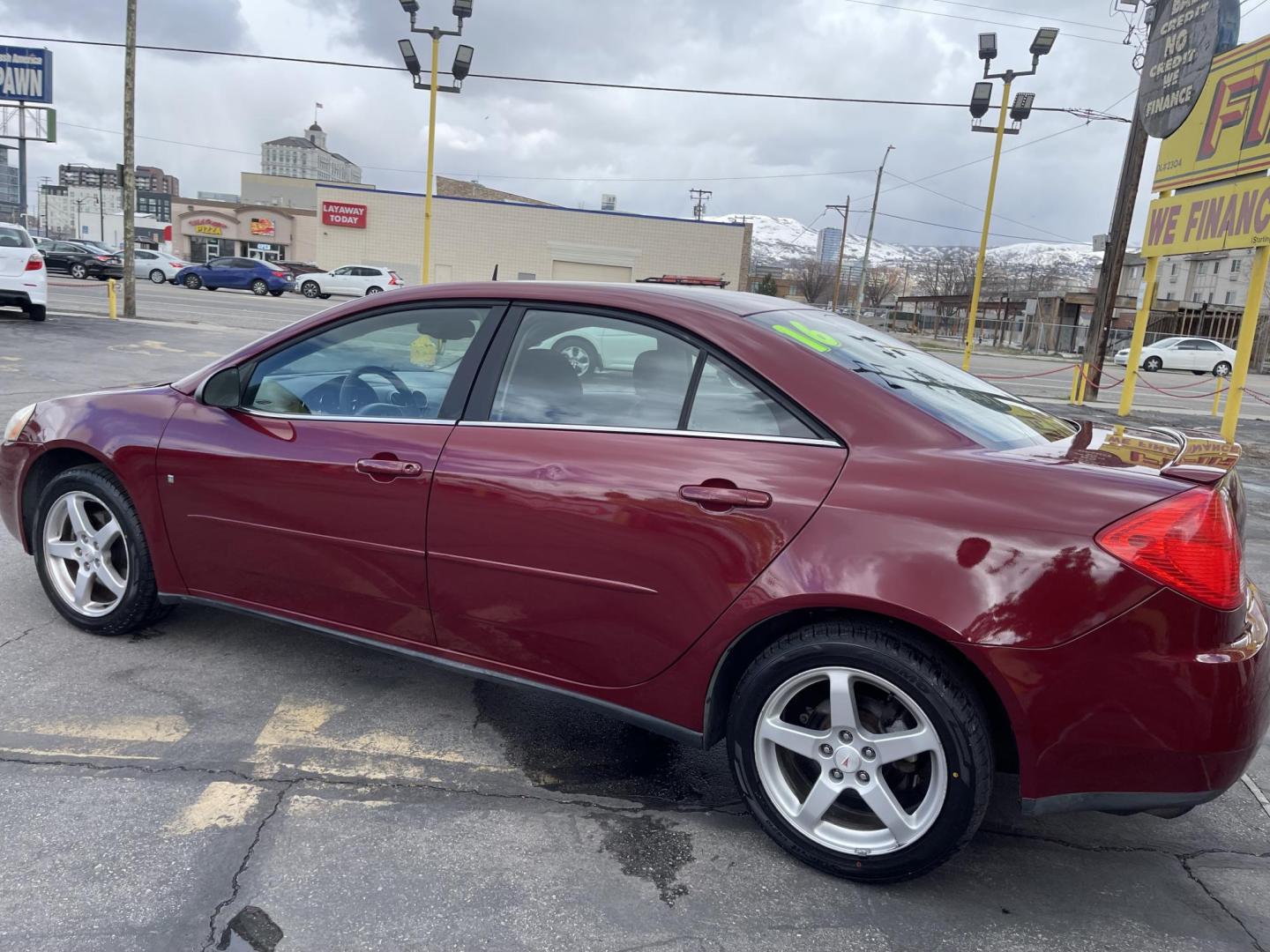 2008 Salsa Red Pearl /Black Pontiac G6 Sedan (1G2ZG57NX84) with an 3.5L V6 OHV 12V engine, 4-Speed Automatic Overdrive transmission, located at 801 South State Street, Salt Lake City, UT, 84111, (801) 328-0098, 40.751953, -111.888206 - Clean car! Clean title! Great commuter car for anyone looking for a good reliable affordable transportation to and from work! Features: Alloy Wheels, Cloth Seats, ABS Brakes, Auxiliary Audio Input, Power Locks, Rear Spoiler, AM/FM Stereo, CD Audio, Power Mirrors, Side Airbags, Air Conditioning, Cr - Photo#10