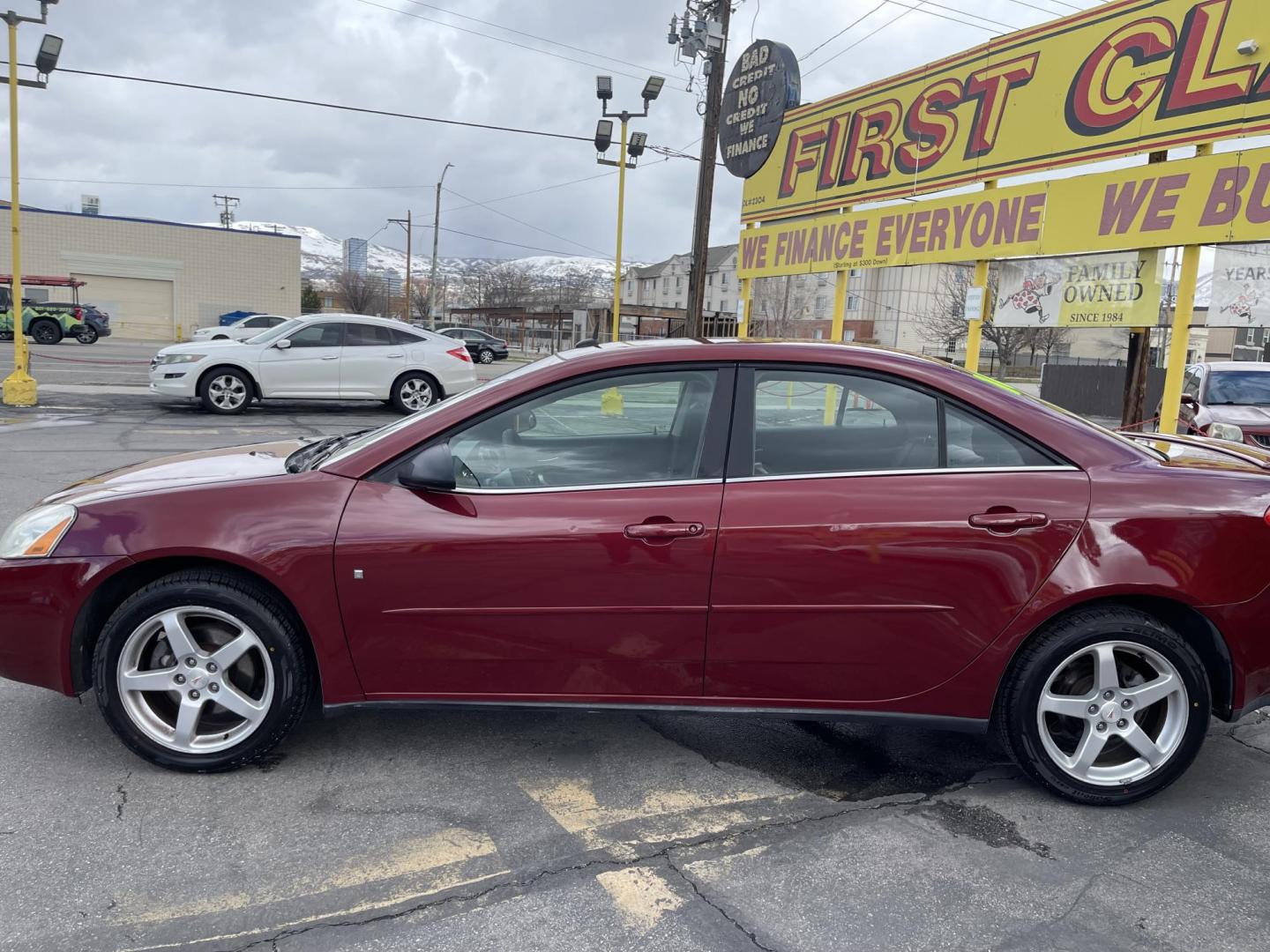 2008 Salsa Red Pearl /Black Pontiac G6 Sedan (1G2ZG57NX84) with an 3.5L V6 OHV 12V engine, 4-Speed Automatic Overdrive transmission, located at 801 South State Street, Salt Lake City, UT, 84111, (801) 328-0098, 40.751953, -111.888206 - Clean car! Clean title! Great commuter car for anyone looking for a good reliable affordable transportation to and from work! Features: Alloy Wheels, Cloth Seats, ABS Brakes, Auxiliary Audio Input, Power Locks, Rear Spoiler, AM/FM Stereo, CD Audio, Power Mirrors, Side Airbags, Air Conditioning, Cr - Photo#11