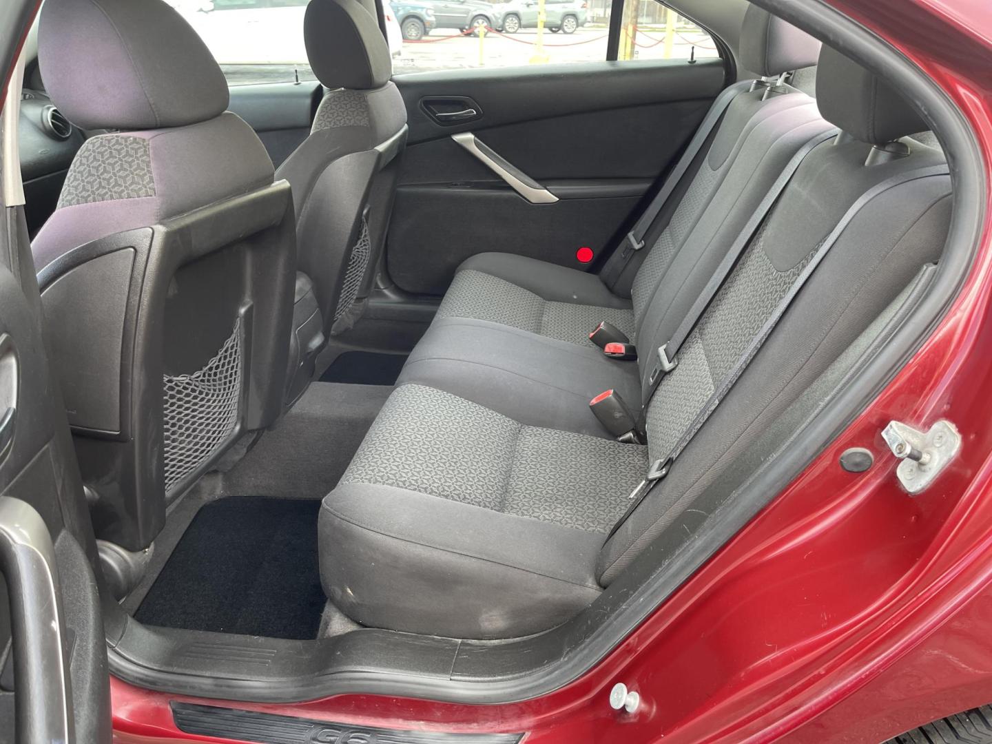 2008 Salsa Red Pearl /Black Pontiac G6 Sedan (1G2ZG57NX84) with an 3.5L V6 OHV 12V engine, 4-Speed Automatic Overdrive transmission, located at 801 South State Street, Salt Lake City, UT, 84111, (801) 328-0098, 40.751953, -111.888206 - Clean car! Clean title! Great commuter car for anyone looking for a good reliable affordable transportation to and from work! Features: Alloy Wheels, Cloth Seats, ABS Brakes, Auxiliary Audio Input, Power Locks, Rear Spoiler, AM/FM Stereo, CD Audio, Power Mirrors, Side Airbags, Air Conditioning, Cr - Photo#13