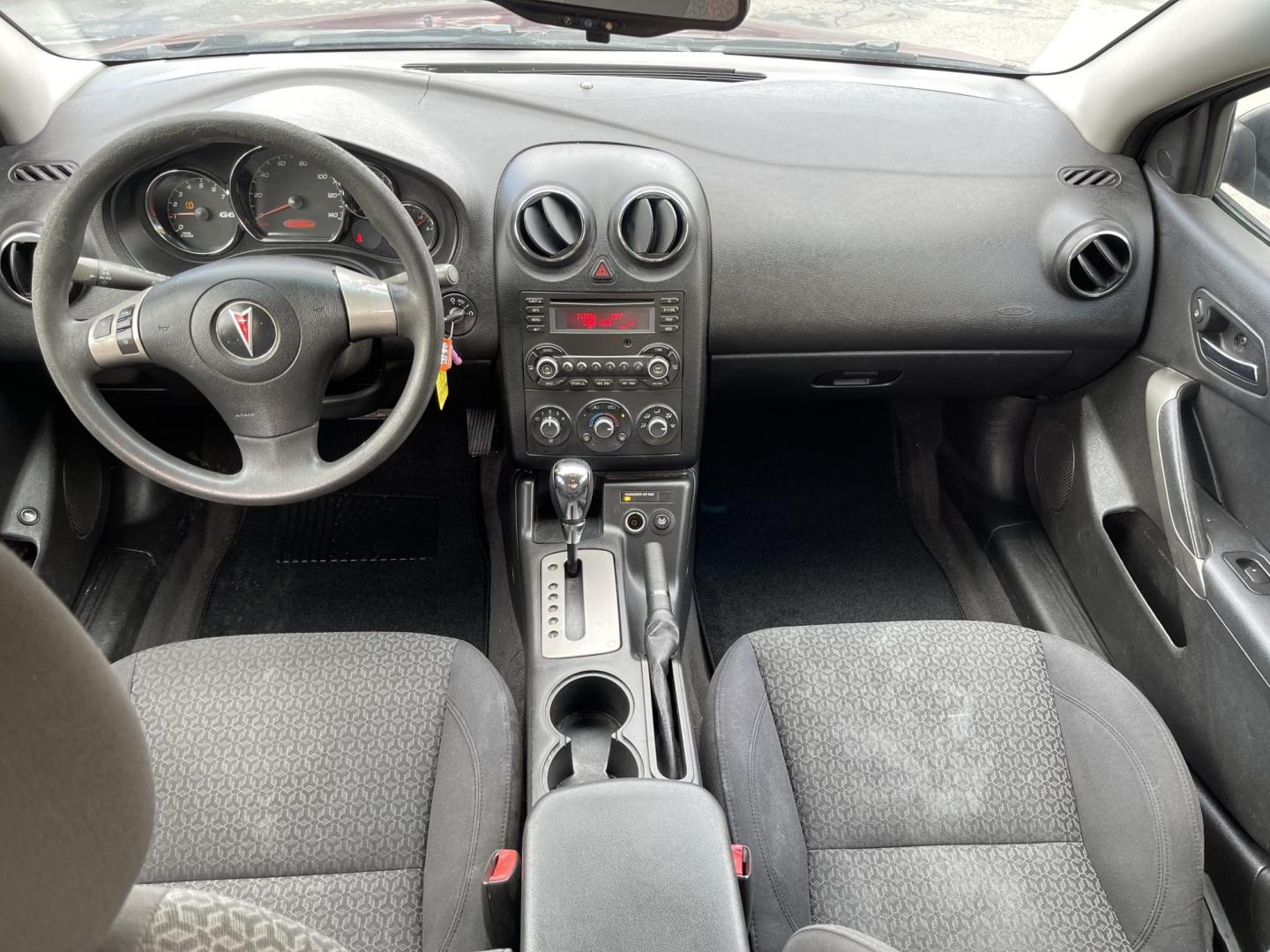 2008 Salsa Red Pearl /Black Pontiac G6 Sedan (1G2ZG57NX84) with an 3.5L V6 OHV 12V engine, 4-Speed Automatic Overdrive transmission, located at 801 South State Street, Salt Lake City, UT, 84111, (801) 328-0098, 40.751953, -111.888206 - Clean car! Clean title! Great commuter car for anyone looking for a good reliable affordable transportation to and from work! Features: Alloy Wheels, Cloth Seats, ABS Brakes, Auxiliary Audio Input, Power Locks, Rear Spoiler, AM/FM Stereo, CD Audio, Power Mirrors, Side Airbags, Air Conditioning, Cr - Photo#14