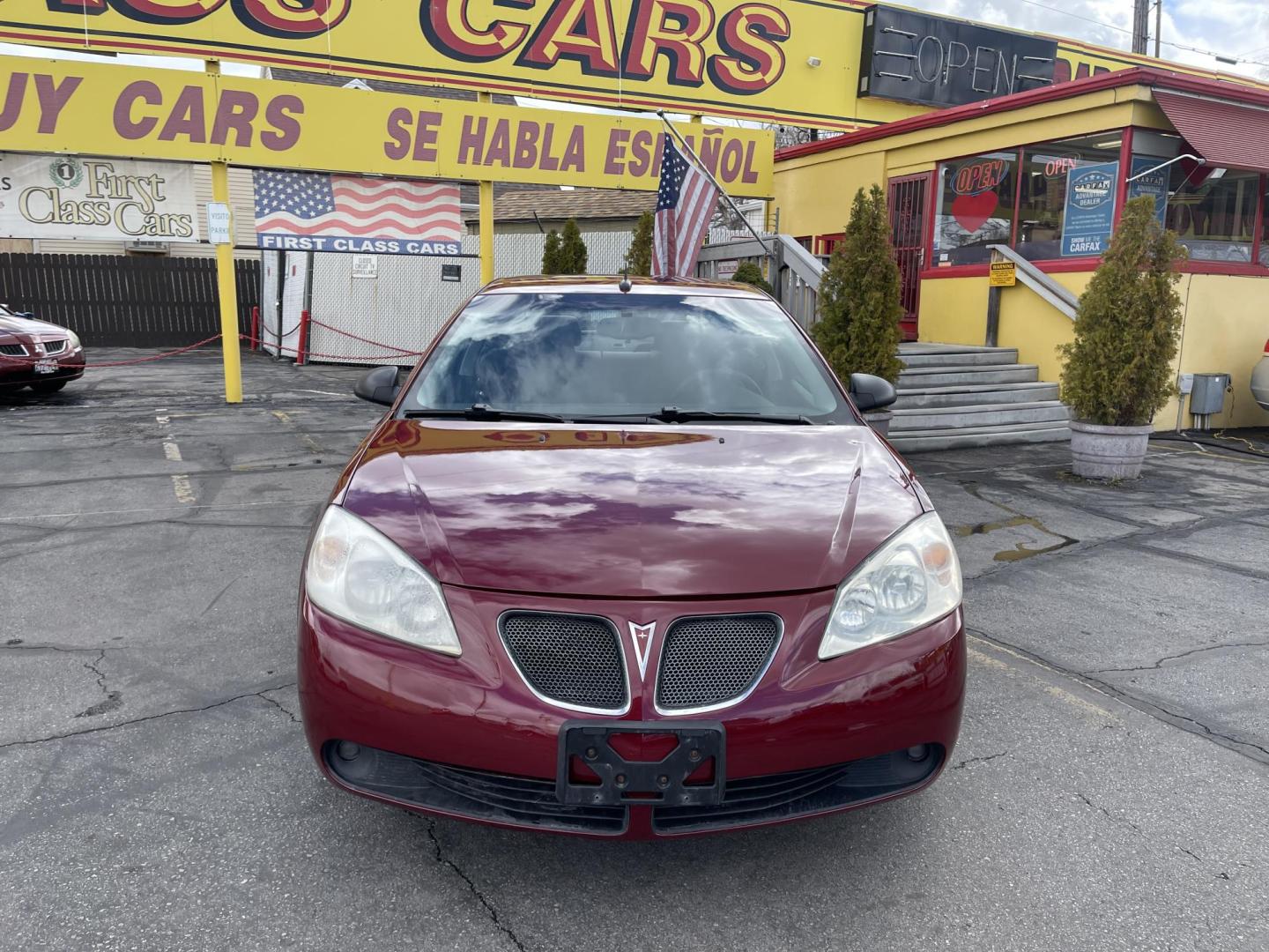 2008 Salsa Red Pearl /Black Pontiac G6 Sedan (1G2ZG57NX84) with an 3.5L V6 OHV 12V engine, 4-Speed Automatic Overdrive transmission, located at 801 South State Street, Salt Lake City, UT, 84111, (801) 328-0098, 40.751953, -111.888206 - Clean car! Clean title! Great commuter car for anyone looking for a good reliable affordable transportation to and from work! Features: Alloy Wheels, Cloth Seats, ABS Brakes, Auxiliary Audio Input, Power Locks, Rear Spoiler, AM/FM Stereo, CD Audio, Power Mirrors, Side Airbags, Air Conditioning, Cr - Photo#2