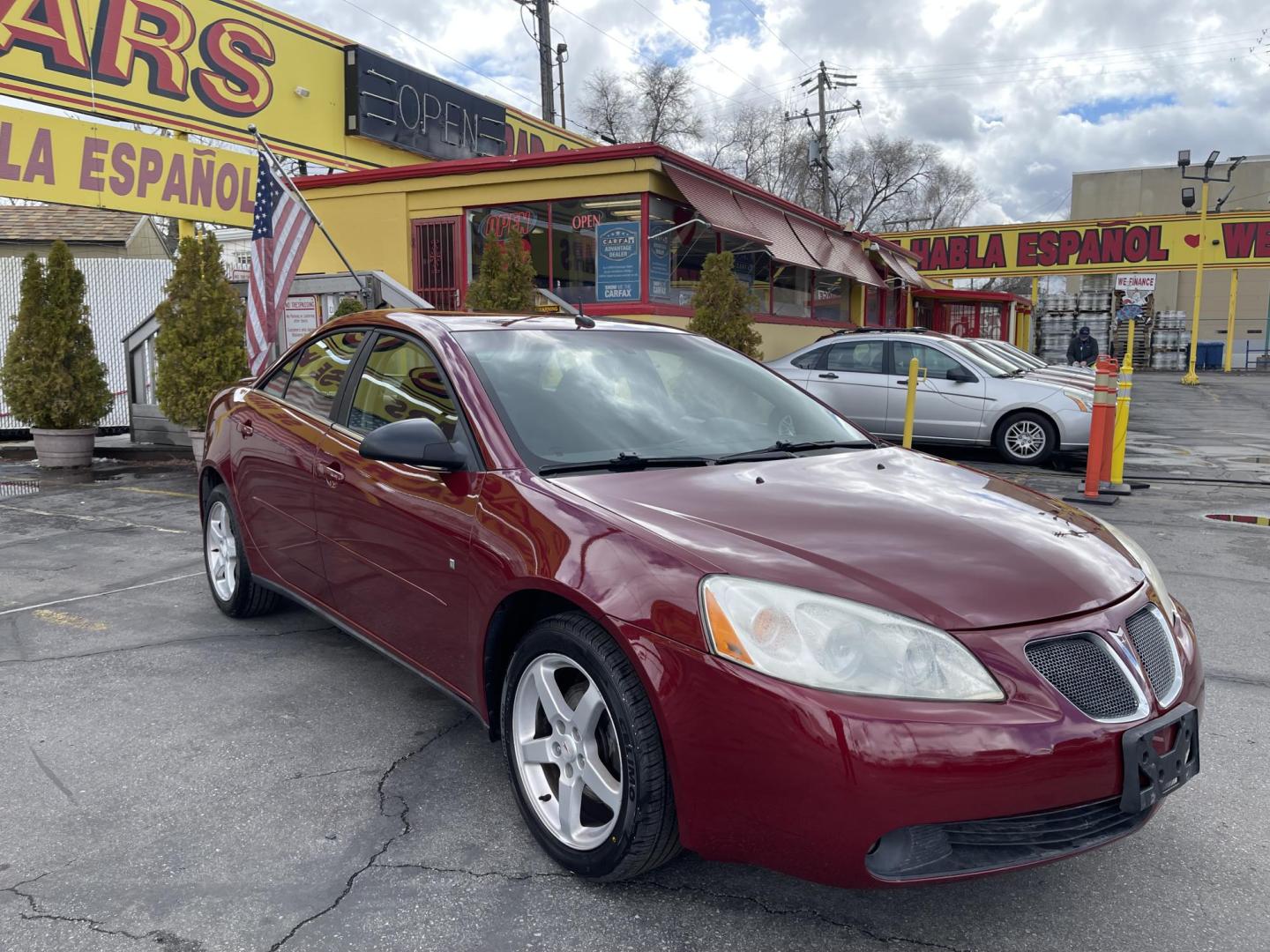 2008 Salsa Red Pearl /Black Pontiac G6 Sedan (1G2ZG57NX84) with an 3.5L V6 OHV 12V engine, 4-Speed Automatic Overdrive transmission, located at 801 South State Street, Salt Lake City, UT, 84111, (801) 328-0098, 40.751953, -111.888206 - Clean car! Clean title! Great commuter car for anyone looking for a good reliable affordable transportation to and from work! Features: Alloy Wheels, Cloth Seats, ABS Brakes, Auxiliary Audio Input, Power Locks, Rear Spoiler, AM/FM Stereo, CD Audio, Power Mirrors, Side Airbags, Air Conditioning, Cr - Photo#4