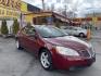 2008 Salsa Red Pearl /Black Pontiac G6 Sedan (1G2ZG57NX84) with an 3.5L V6 OHV 12V engine, 4-Speed Automatic Overdrive transmission, located at 801 South State Street, Salt Lake City, UT, 84111, (801) 328-0098, 40.751953, -111.888206 - Clean car! Clean title! Great commuter car for anyone looking for a good reliable affordable transportation to and from work! Features: Alloy Wheels, Cloth Seats, ABS Brakes, Auxiliary Audio Input, Power Locks, Rear Spoiler, AM/FM Stereo, CD Audio, Power Mirrors, Side Airbags, Air Conditioning, Cr - Photo#4