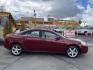 2008 Salsa Red Pearl /Black Pontiac G6 Sedan (1G2ZG57NX84) with an 3.5L V6 OHV 12V engine, 4-Speed Automatic Overdrive transmission, located at 801 South State Street, Salt Lake City, UT, 84111, (801) 328-0098, 40.751953, -111.888206 - Clean car! Clean title! Great commuter car for anyone looking for a good reliable affordable transportation to and from work! Features: Alloy Wheels, Cloth Seats, ABS Brakes, Auxiliary Audio Input, Power Locks, Rear Spoiler, AM/FM Stereo, CD Audio, Power Mirrors, Side Airbags, Air Conditioning, Cr - Photo#5