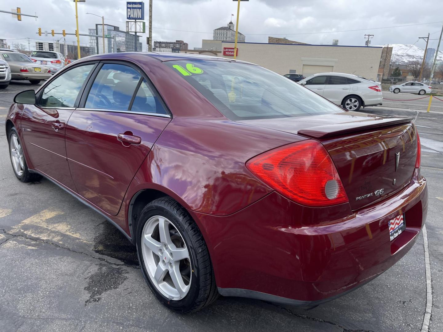 2008 Salsa Red Pearl /Black Pontiac G6 Sedan (1G2ZG57NX84) with an 3.5L V6 OHV 12V engine, 4-Speed Automatic Overdrive transmission, located at 801 South State Street, Salt Lake City, UT, 84111, (801) 328-0098, 40.751953, -111.888206 - Clean car! Clean title! Great commuter car for anyone looking for a good reliable affordable transportation to and from work! Features: Alloy Wheels, Cloth Seats, ABS Brakes, Auxiliary Audio Input, Power Locks, Rear Spoiler, AM/FM Stereo, CD Audio, Power Mirrors, Side Airbags, Air Conditioning, Cr - Photo#8