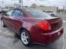 2008 Salsa Red Pearl /Black Pontiac G6 Sedan (1G2ZG57NX84) with an 3.5L V6 OHV 12V engine, 4-Speed Automatic Overdrive transmission, located at 801 South State Street, Salt Lake City, UT, 84111, (801) 328-0098, 40.751953, -111.888206 - Clean car! Clean title! Great commuter car for anyone looking for a good reliable affordable transportation to and from work! Features: Alloy Wheels, Cloth Seats, ABS Brakes, Auxiliary Audio Input, Power Locks, Rear Spoiler, AM/FM Stereo, CD Audio, Power Mirrors, Side Airbags, Air Conditioning, Cr - Photo#8
