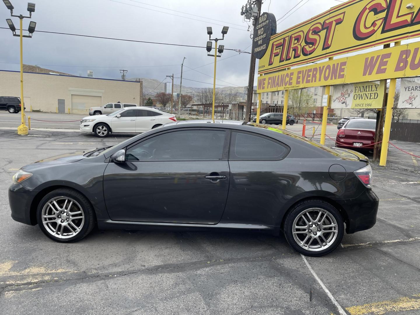 2010 Mineral Gray Metallic /BLACK Scion tC Sports Coupe 4-Spd AT (JTKDE3B74A0) with an 2.4L L4 DOHC 16V engine, 4-Speed Automatic transmission, located at 801 South State Street, Salt Lake City, UT, 84111, (801) 328-0098, 40.751953, -111.888206 - Clean title! Clean Carfax no accidents reported on Carfax history report! Vehicle has been meticulously maintained according to the Carfax report. Good on gas the 2010 Scion tC with the 2.4L automatic engine is EPA-estimated to get 21 mpg in the city and 29 mpg on the highway. Features: Alloy Whee - Photo#9