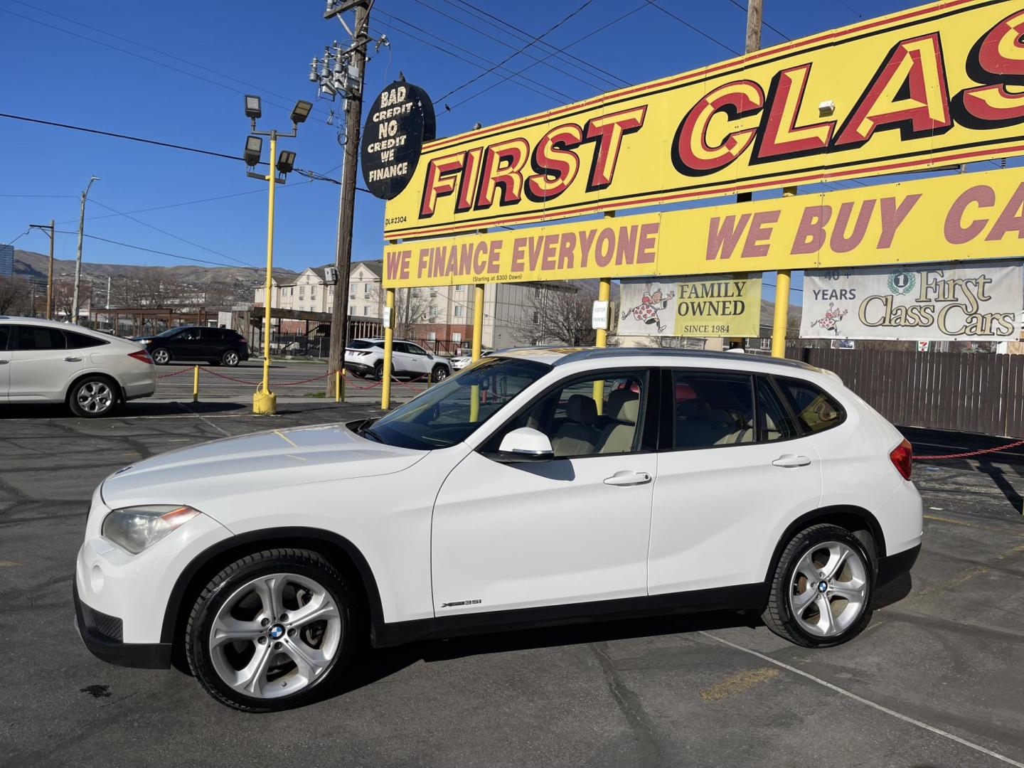 2013 Super White /Tan BMW X1 xDrive35i (WBAVM5C51DV) with an 3.0L L6 DOHC 24V engine, 6-Speed Automatic transmission, located at 801 South State Street, Salt Lake City, UT, 84111, (801) 328-0098, 40.751953, -111.888206 - Super clean immaculate condition inside and out! AWD great all year SUV! Clean title! Hard to find car! No accidents on Carfax! Only 2 previous owners! Originally from Florida according to Carfax it came to Utah with the second owner. Features: 4WD/AWD, Memory Seat(s), Alloy Wheels, Navigation Syst - Photo#10