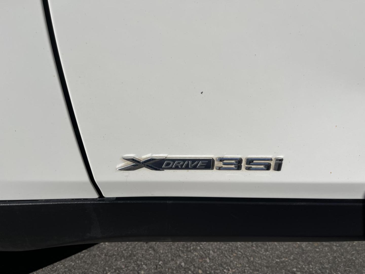 2013 Super White /Tan BMW X1 xDrive35i (WBAVM5C51DV) with an 3.0L L6 DOHC 24V engine, 6-Speed Automatic transmission, located at 801 South State Street, Salt Lake City, UT, 84111, (801) 328-0098, 40.751953, -111.888206 - Super clean immaculate condition inside and out! AWD great all year SUV! Clean title! Hard to find car! No accidents on Carfax! Only 2 previous owners! Originally from Florida according to Carfax it came to Utah with the second owner. Features: 4WD/AWD, Memory Seat(s), Alloy Wheels, Navigation Syst - Photo#15