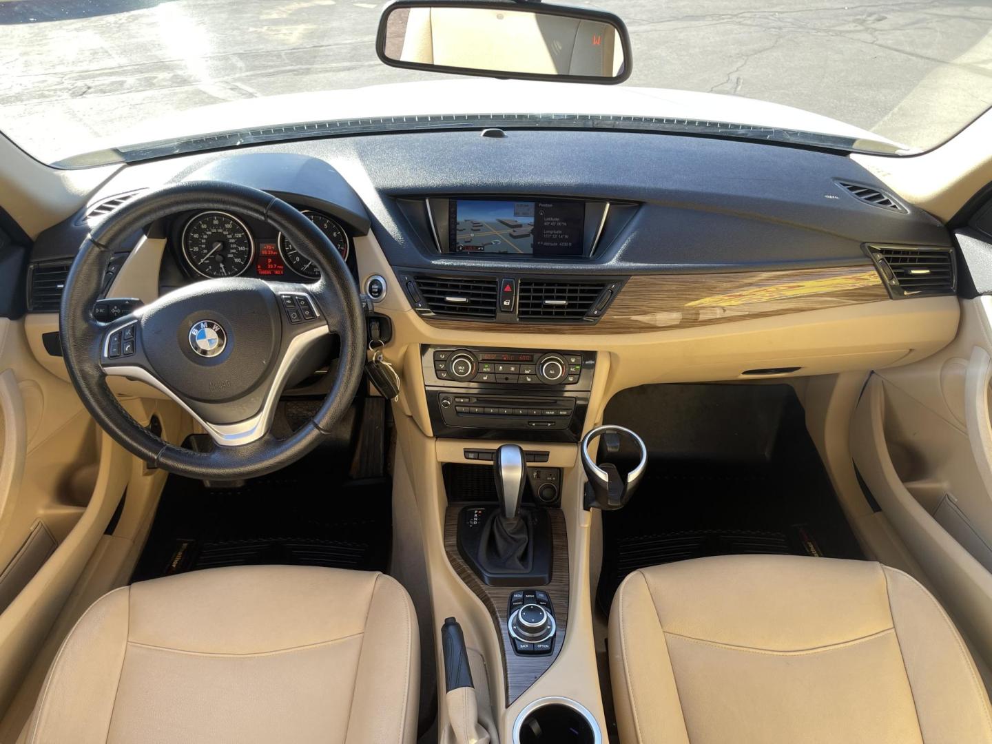 2013 Super White /Tan BMW X1 xDrive35i (WBAVM5C51DV) with an 3.0L L6 DOHC 24V engine, 6-Speed Automatic transmission, located at 801 South State Street, Salt Lake City, UT, 84111, (801) 328-0098, 40.751953, -111.888206 - Super clean immaculate condition inside and out! AWD great all year SUV! Clean title! Hard to find car! No accidents on Carfax! Only 2 previous owners! Originally from Florida according to Carfax it came to Utah with the second owner. Features: 4WD/AWD, Memory Seat(s), Alloy Wheels, Navigation Syst - Photo#17
