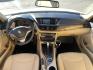 2013 Super White /Tan BMW X1 xDrive35i (WBAVM5C51DV) with an 3.0L L6 DOHC 24V engine, 6-Speed Automatic transmission, located at 801 South State Street, Salt Lake City, UT, 84111, (801) 328-0098, 40.751953, -111.888206 - Super clean immaculate condition inside and out! AWD great all year SUV! Clean title! Hard to find car! No accidents on Carfax! Only 2 previous owners! Originally from Florida according to Carfax it came to Utah with the second owner. Features: 4WD/AWD, Memory Seat(s), Alloy Wheels, Navigation Syst - Photo#17