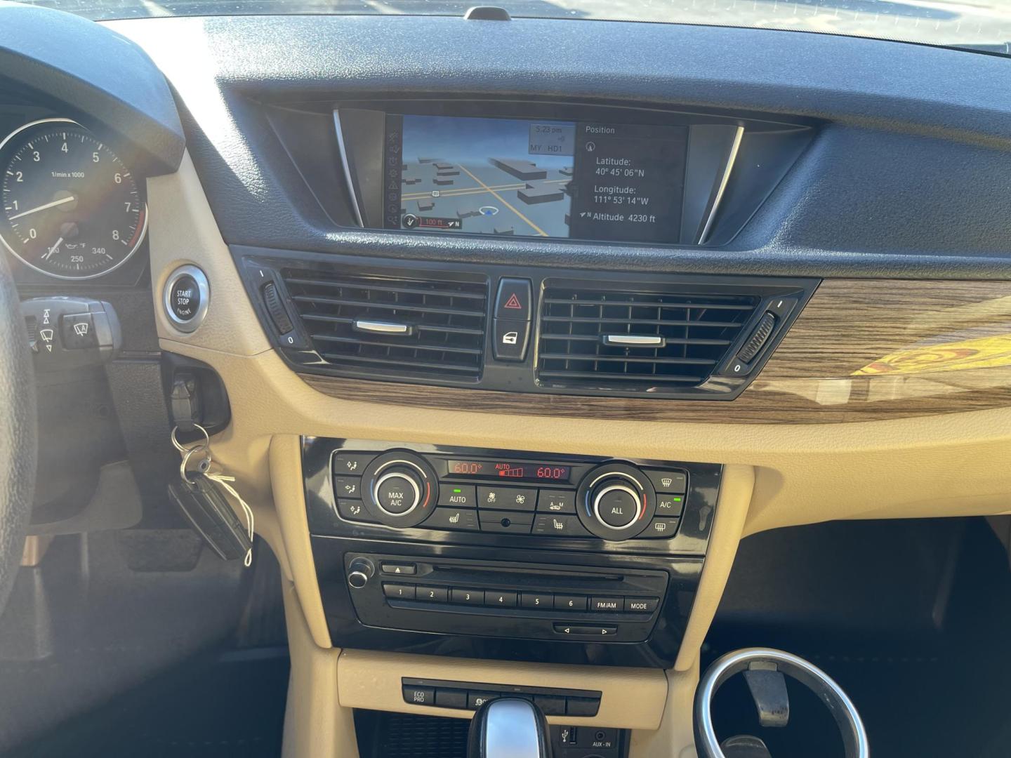 2013 Super White /Tan BMW X1 xDrive35i (WBAVM5C51DV) with an 3.0L L6 DOHC 24V engine, 6-Speed Automatic transmission, located at 801 South State Street, Salt Lake City, UT, 84111, (801) 328-0098, 40.751953, -111.888206 - Super clean immaculate condition inside and out! AWD great all year SUV! Clean title! Hard to find car! No accidents on Carfax! Only 2 previous owners! Originally from Florida according to Carfax it came to Utah with the second owner. Features: 4WD/AWD, Memory Seat(s), Alloy Wheels, Navigation Syst - Photo#18
