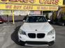 2013 Super White /Tan BMW X1 xDrive35i (WBAVM5C51DV) with an 3.0L L6 DOHC 24V engine, 6-Speed Automatic transmission, located at 801 South State Street, Salt Lake City, UT, 84111, (801) 328-0098, 40.751953, -111.888206 - Super clean immaculate condition inside and out! AWD great all year SUV! Clean title! Hard to find car! No accidents on Carfax! Only 2 previous owners! Originally from Florida according to Carfax it came to Utah with the second owner. Features: 4WD/AWD, Memory Seat(s), Alloy Wheels, Navigation Syst - Photo#2