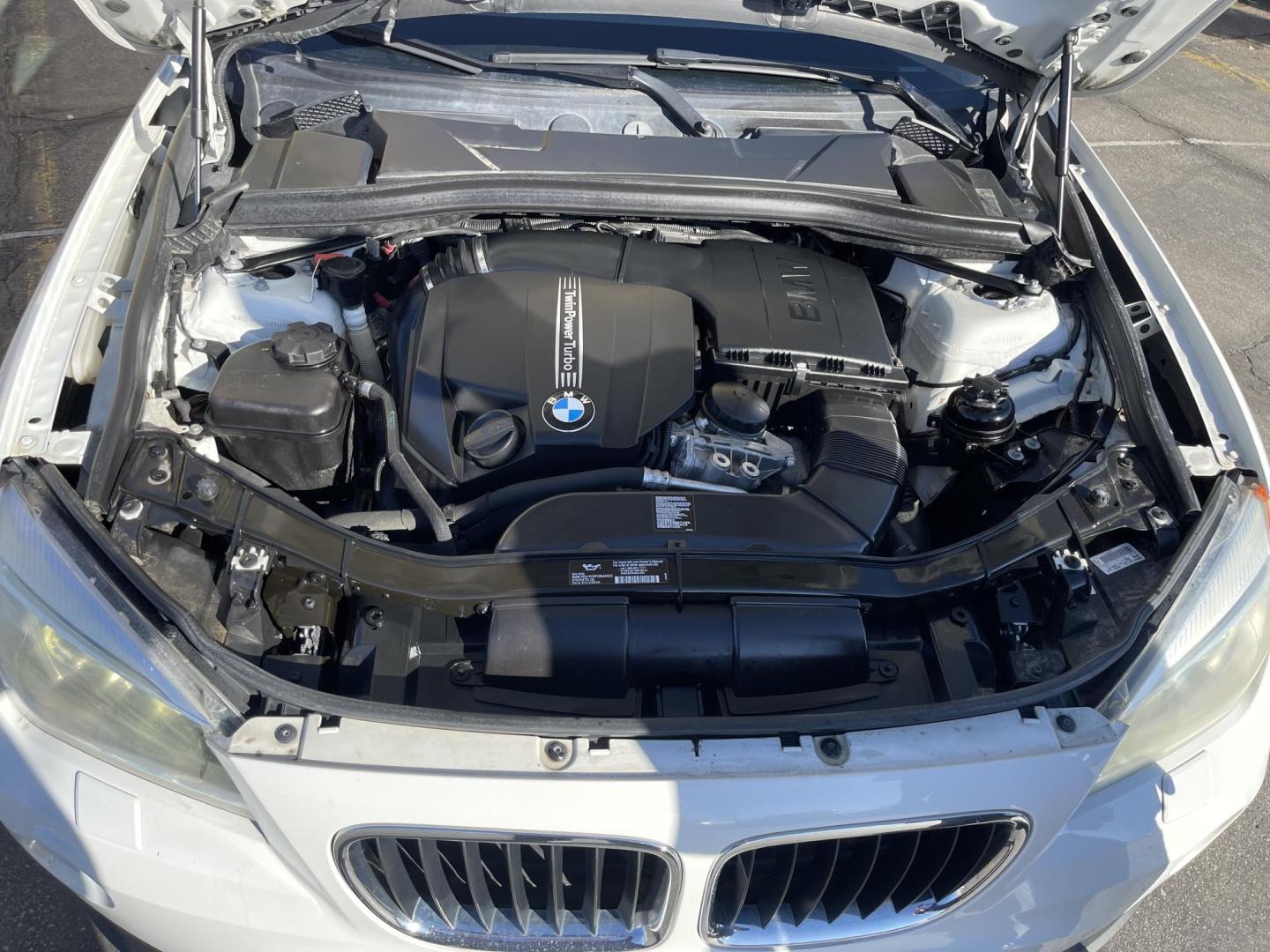 2013 Super White /Tan BMW X1 xDrive35i (WBAVM5C51DV) with an 3.0L L6 DOHC 24V engine, 6-Speed Automatic transmission, located at 801 South State Street, Salt Lake City, UT, 84111, (801) 328-0098, 40.751953, -111.888206 - Super clean immaculate condition inside and out! AWD great all year SUV! Clean title! Hard to find car! No accidents on Carfax! Only 2 previous owners! Originally from Florida according to Carfax it came to Utah with the second owner. Features: 4WD/AWD, Memory Seat(s), Alloy Wheels, Navigation Syst - Photo#25