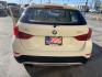 2013 Super White /Tan BMW X1 xDrive35i (WBAVM5C51DV) with an 3.0L L6 DOHC 24V engine, 6-Speed Automatic transmission, located at 801 South State Street, Salt Lake City, UT, 84111, (801) 328-0098, 40.751953, -111.888206 - Super clean immaculate condition inside and out! AWD great all year SUV! Clean title! Hard to find car! No accidents on Carfax! Only 2 previous owners! Originally from Florida according to Carfax it came to Utah with the second owner. Features: 4WD/AWD, Memory Seat(s), Alloy Wheels, Navigation Syst - Photo#31