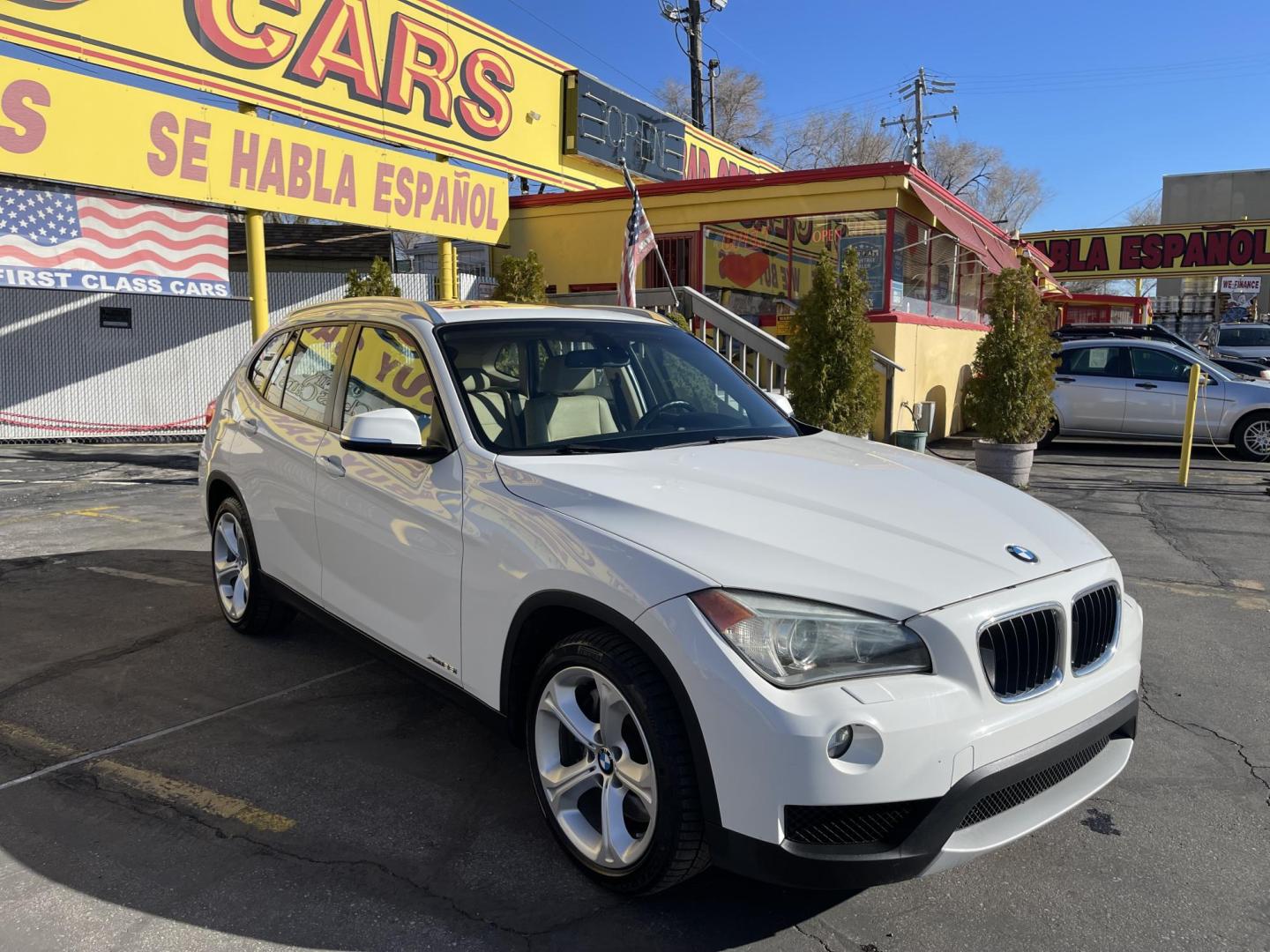 2013 Super White /Tan BMW X1 xDrive35i (WBAVM5C51DV) with an 3.0L L6 DOHC 24V engine, 6-Speed Automatic transmission, located at 801 South State Street, Salt Lake City, UT, 84111, (801) 328-0098, 40.751953, -111.888206 - Super clean immaculate condition inside and out! AWD great all year SUV! Clean title! Hard to find car! No accidents on Carfax! Only 2 previous owners! Originally from Florida according to Carfax it came to Utah with the second owner. Features: 4WD/AWD, Memory Seat(s), Alloy Wheels, Navigation Syst - Photo#3