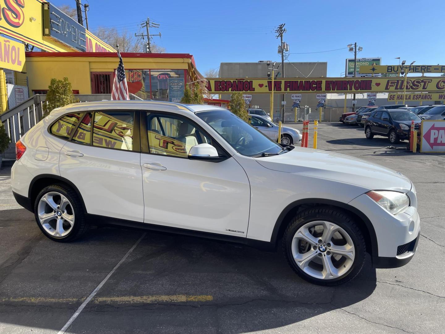 2013 Super White /Tan BMW X1 xDrive35i (WBAVM5C51DV) with an 3.0L L6 DOHC 24V engine, 6-Speed Automatic transmission, located at 801 South State Street, Salt Lake City, UT, 84111, (801) 328-0098, 40.751953, -111.888206 - Super clean immaculate condition inside and out! AWD great all year SUV! Clean title! Hard to find car! No accidents on Carfax! Only 2 previous owners! Originally from Florida according to Carfax it came to Utah with the second owner. Features: 4WD/AWD, Memory Seat(s), Alloy Wheels, Navigation Syst - Photo#4