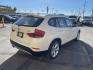 2013 Super White /Tan BMW X1 xDrive35i (WBAVM5C51DV) with an 3.0L L6 DOHC 24V engine, 6-Speed Automatic transmission, located at 801 South State Street, Salt Lake City, UT, 84111, (801) 328-0098, 40.751953, -111.888206 - Super clean immaculate condition inside and out! AWD great all year SUV! Clean title! Hard to find car! No accidents on Carfax! Only 2 previous owners! Originally from Florida according to Carfax it came to Utah with the second owner. Features: 4WD/AWD, Memory Seat(s), Alloy Wheels, Navigation Syst - Photo#6