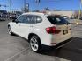 2013 Super White /Tan BMW X1 xDrive35i (WBAVM5C51DV) with an 3.0L L6 DOHC 24V engine, 6-Speed Automatic transmission, located at 801 South State Street, Salt Lake City, UT, 84111, (801) 328-0098, 40.751953, -111.888206 - Super clean immaculate condition inside and out! AWD great all year SUV! Clean title! Hard to find car! No accidents on Carfax! Only 2 previous owners! Originally from Florida according to Carfax it came to Utah with the second owner. Features: 4WD/AWD, Memory Seat(s), Alloy Wheels, Navigation Syst - Photo#8