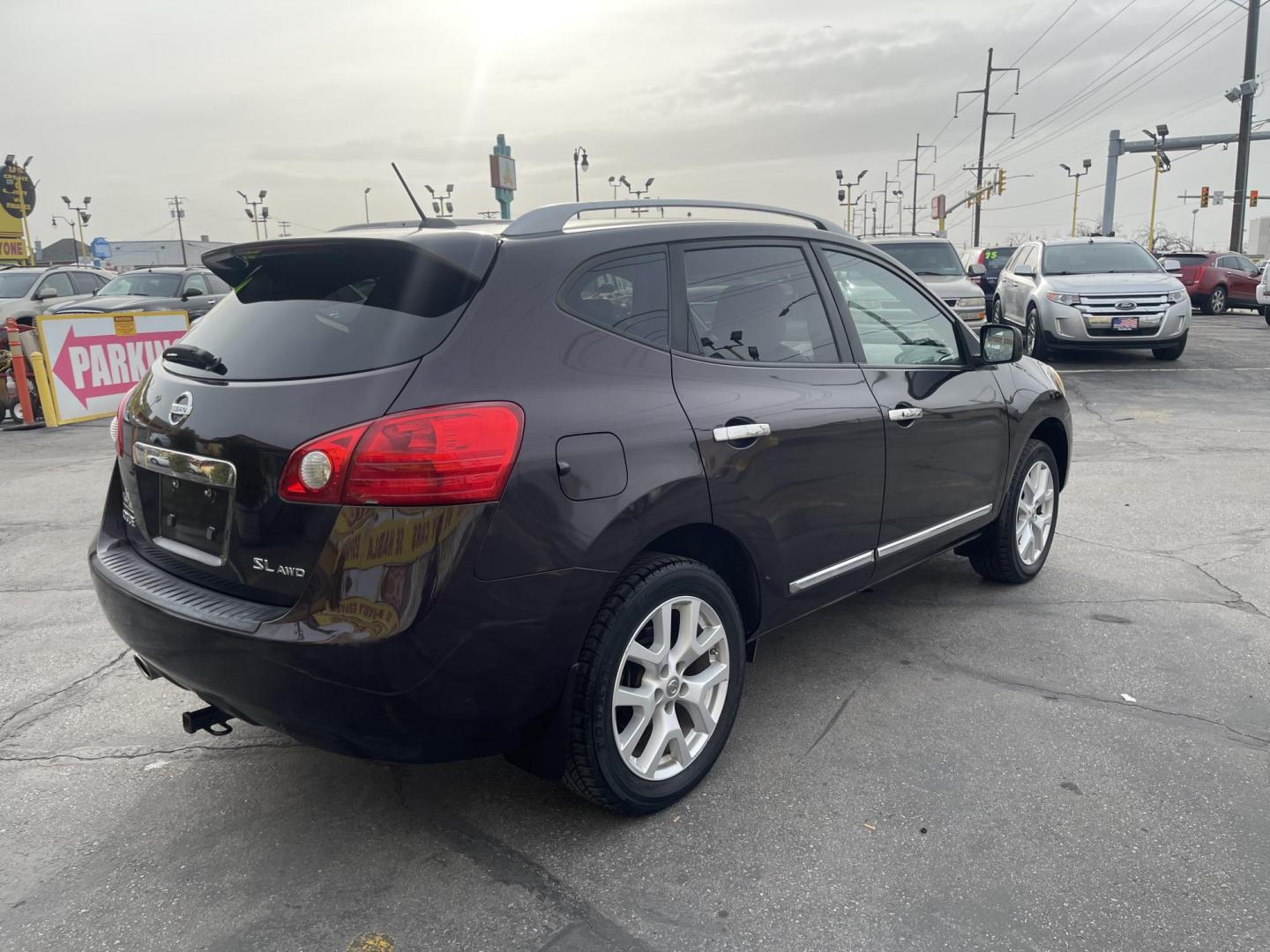 2011 Black Cherry /Tan Nissan Rogue S AWD (JN8AS5MV4BW) with an 2.5L L4 DOHC 16V engine, CVT transmission, located at 801 South State Street, Salt Lake City, UT, 84111, (801) 328-0098, 40.751953, -111.888206 - Clean title! No accidents on Carfax!!! Immaculate condition inside and out hard find! Must see for anyone looking for a clean affordable suv with AWD great in the snow! Only 2 previous owners according to Carfax!!! Features: 4WD/AWD, Bluetooth Technology, Cloth Seats, ABS Brakes, Auxiliary Audio In - Photo#6
