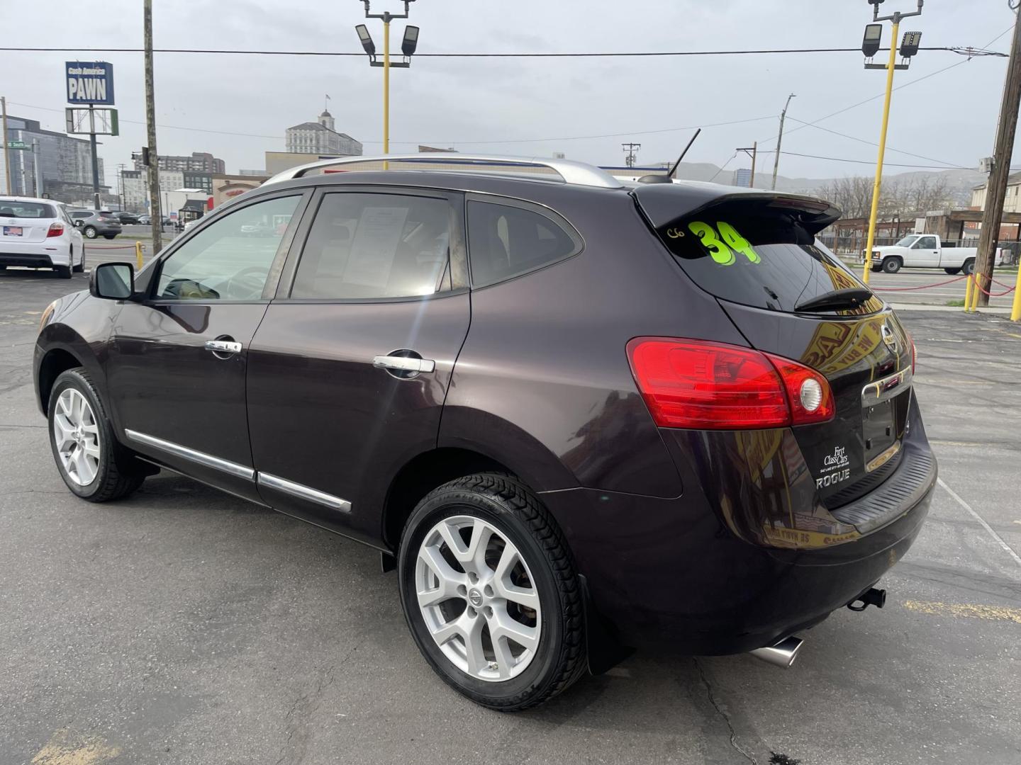 2011 Black Cherry /Tan Nissan Rogue S AWD (JN8AS5MV4BW) with an 2.5L L4 DOHC 16V engine, CVT transmission, located at 801 South State Street, Salt Lake City, UT, 84111, (801) 328-0098, 40.751953, -111.888206 - Clean title! No accidents on Carfax!!! Immaculate condition inside and out hard find! Must see for anyone looking for a clean affordable suv with AWD great in the snow! Only 2 previous owners according to Carfax!!! Features: 4WD/AWD, Bluetooth Technology, Cloth Seats, ABS Brakes, Auxiliary Audio In - Photo#8