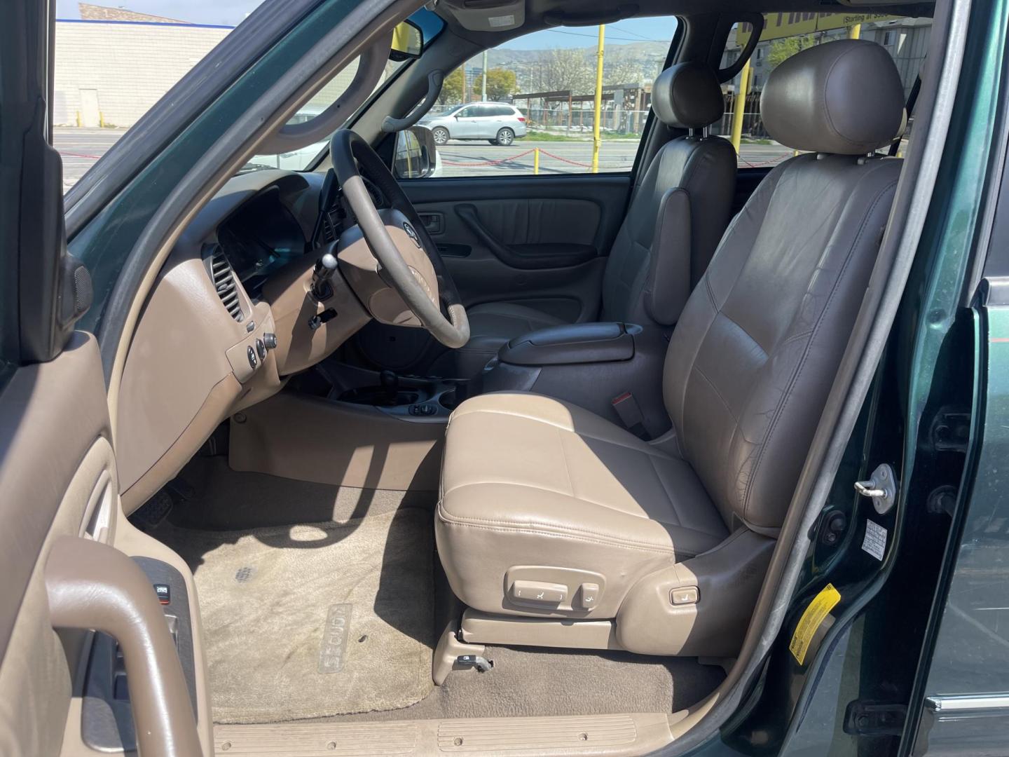 2004 Emerald Green /Tan Toyota Sequoia Limited 4WD (5TDBT48A44S) with an 4.7L V8 DOHC 32V engine, 4-Speed Automatic Overdrive transmission, located at 801 South State Street, Salt Lake City, UT, 84111, (801) 328-0098, 40.751953, -111.888206 - Clean title! No accidents on Carfax! Hard to find Sequoia with 4x4! Real nice 3rd row seating perfect family vehicle!!! Features: 20 Inch Plus Wheels, Rear Air Conditioning, 4WD/AWD, Rear Entertainment System, Alloy Wheels, Running Boards, Front Seat Heaters, Sunroof(s), JBL Sound System, Third Row - Photo#12