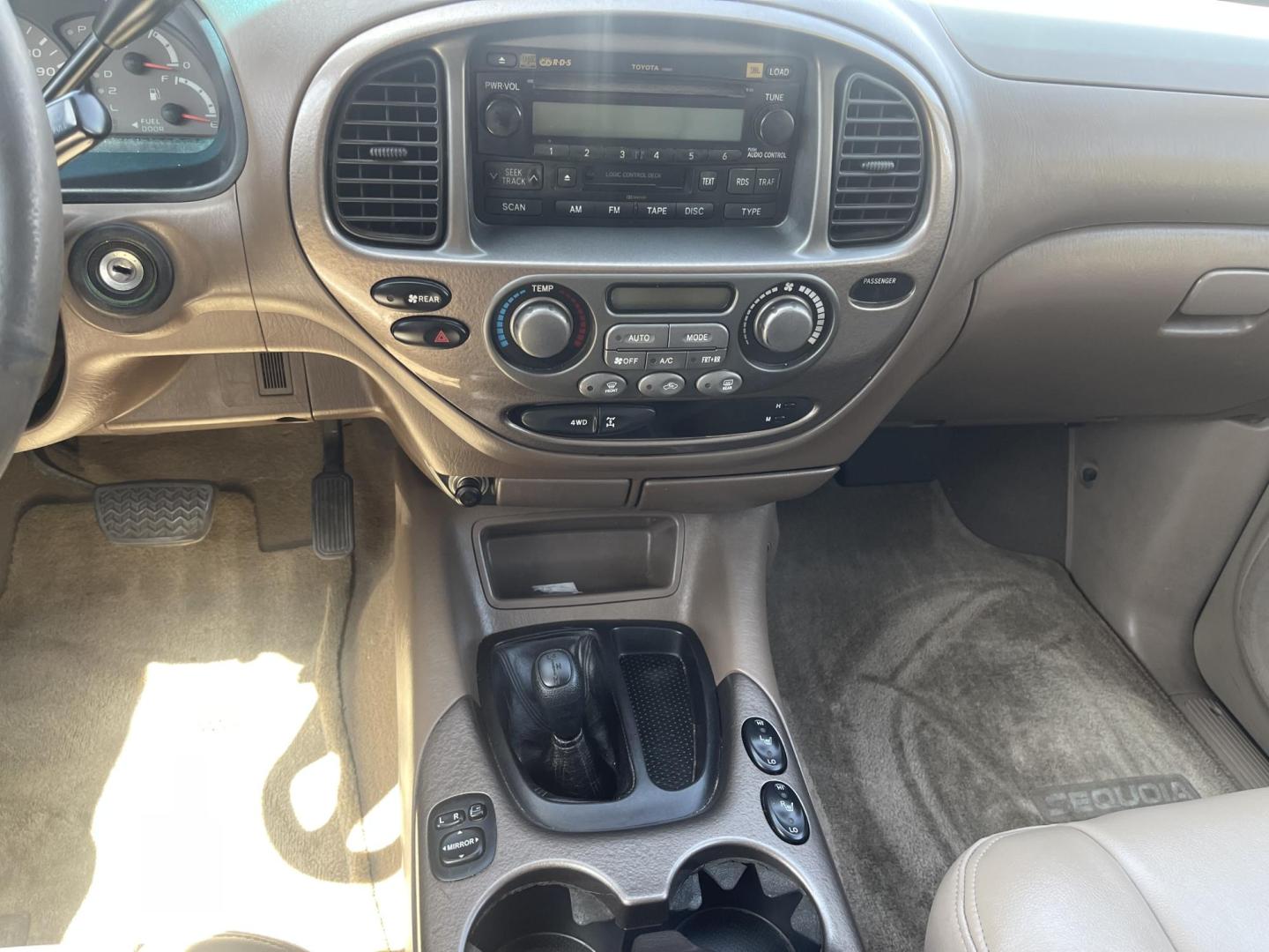 2004 Emerald Green /Tan Toyota Sequoia Limited 4WD (5TDBT48A44S) with an 4.7L V8 DOHC 32V engine, 4-Speed Automatic Overdrive transmission, located at 801 South State Street, Salt Lake City, UT, 84111, (801) 328-0098, 40.751953, -111.888206 - Clean title! No accidents on Carfax! Hard to find Sequoia with 4x4! Real nice 3rd row seating perfect family vehicle!!! Features: 20 Inch Plus Wheels, Rear Air Conditioning, 4WD/AWD, Rear Entertainment System, Alloy Wheels, Running Boards, Front Seat Heaters, Sunroof(s), JBL Sound System, Third Row - Photo#15