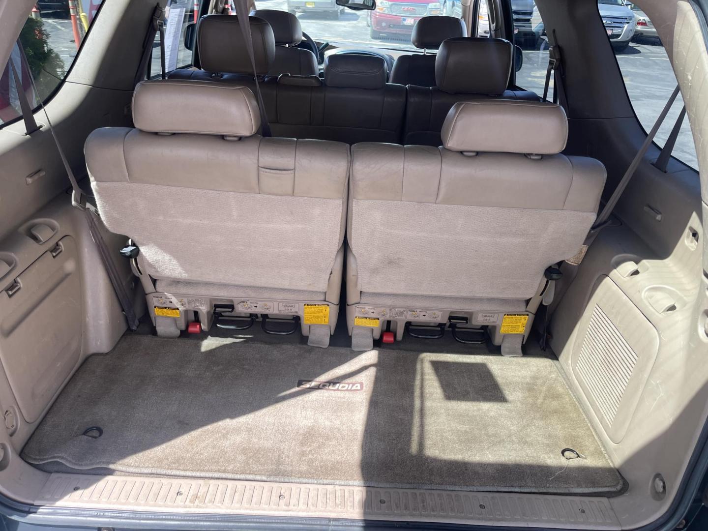 2004 Emerald Green /Tan Toyota Sequoia Limited 4WD (5TDBT48A44S) with an 4.7L V8 DOHC 32V engine, 4-Speed Automatic Overdrive transmission, located at 801 South State Street, Salt Lake City, UT, 84111, (801) 328-0098, 40.751953, -111.888206 - Clean title! No accidents on Carfax! Hard to find Sequoia with 4x4! Real nice 3rd row seating perfect family vehicle!!! Features: 20 Inch Plus Wheels, Rear Air Conditioning, 4WD/AWD, Rear Entertainment System, Alloy Wheels, Running Boards, Front Seat Heaters, Sunroof(s), JBL Sound System, Third Row - Photo#23