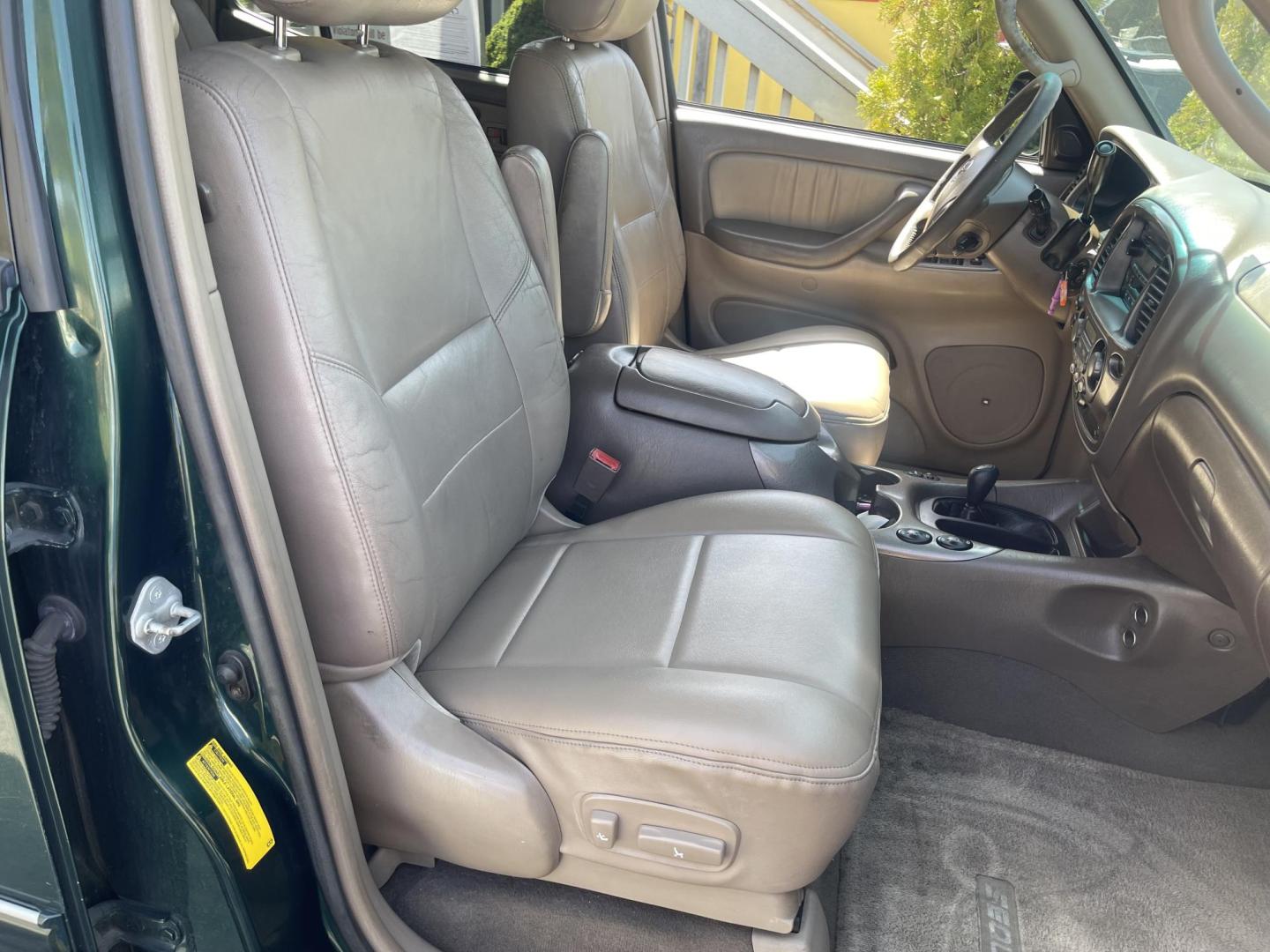2004 Emerald Green /Tan Toyota Sequoia Limited 4WD (5TDBT48A44S) with an 4.7L V8 DOHC 32V engine, 4-Speed Automatic Overdrive transmission, located at 801 South State Street, Salt Lake City, UT, 84111, (801) 328-0098, 40.751953, -111.888206 - Clean title! No accidents on Carfax! Hard to find Sequoia with 4x4! Real nice 3rd row seating perfect family vehicle!!! Features: 20 Inch Plus Wheels, Rear Air Conditioning, 4WD/AWD, Rear Entertainment System, Alloy Wheels, Running Boards, Front Seat Heaters, Sunroof(s), JBL Sound System, Third Row - Photo#26