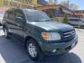 2004 Emerald Green /Tan Toyota Sequoia Limited 4WD (5TDBT48A44S) with an 4.7L V8 DOHC 32V engine, 4-Speed Automatic Overdrive transmission, located at 801 South State Street, Salt Lake City, UT, 84111, (801) 328-0098, 40.751953, -111.888206 - Clean title! No accidents on Carfax! Hard to find Sequoia with 4x4! Real nice 3rd row seating perfect family vehicle!!! Features: 20 Inch Plus Wheels, Rear Air Conditioning, 4WD/AWD, Rear Entertainment System, Alloy Wheels, Running Boards, Front Seat Heaters, Sunroof(s), JBL Sound System, Third Row - Photo#3