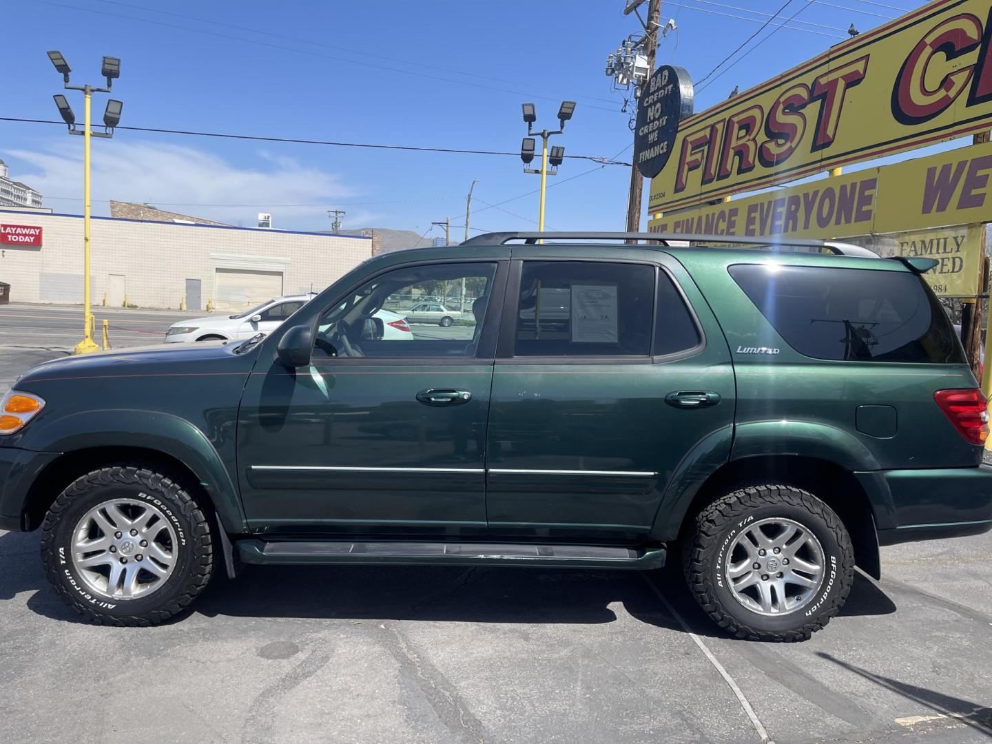 2004 Emerald Green /Tan Toyota Sequoia Limited 4WD (5TDBT48A44S) with an 4.7L V8 DOHC 32V engine, 4-Speed Automatic Overdrive transmission, located at 801 South State Street, Salt Lake City, UT, 84111, (801) 328-0098, 40.751953, -111.888206 - Clean title! No accidents on Carfax! Hard to find Sequoia with 4x4! Real nice 3rd row seating perfect family vehicle!!! Features: 20 Inch Plus Wheels, Rear Air Conditioning, 4WD/AWD, Rear Entertainment System, Alloy Wheels, Running Boards, Front Seat Heaters, Sunroof(s), JBL Sound System, Third Row - Photo#8