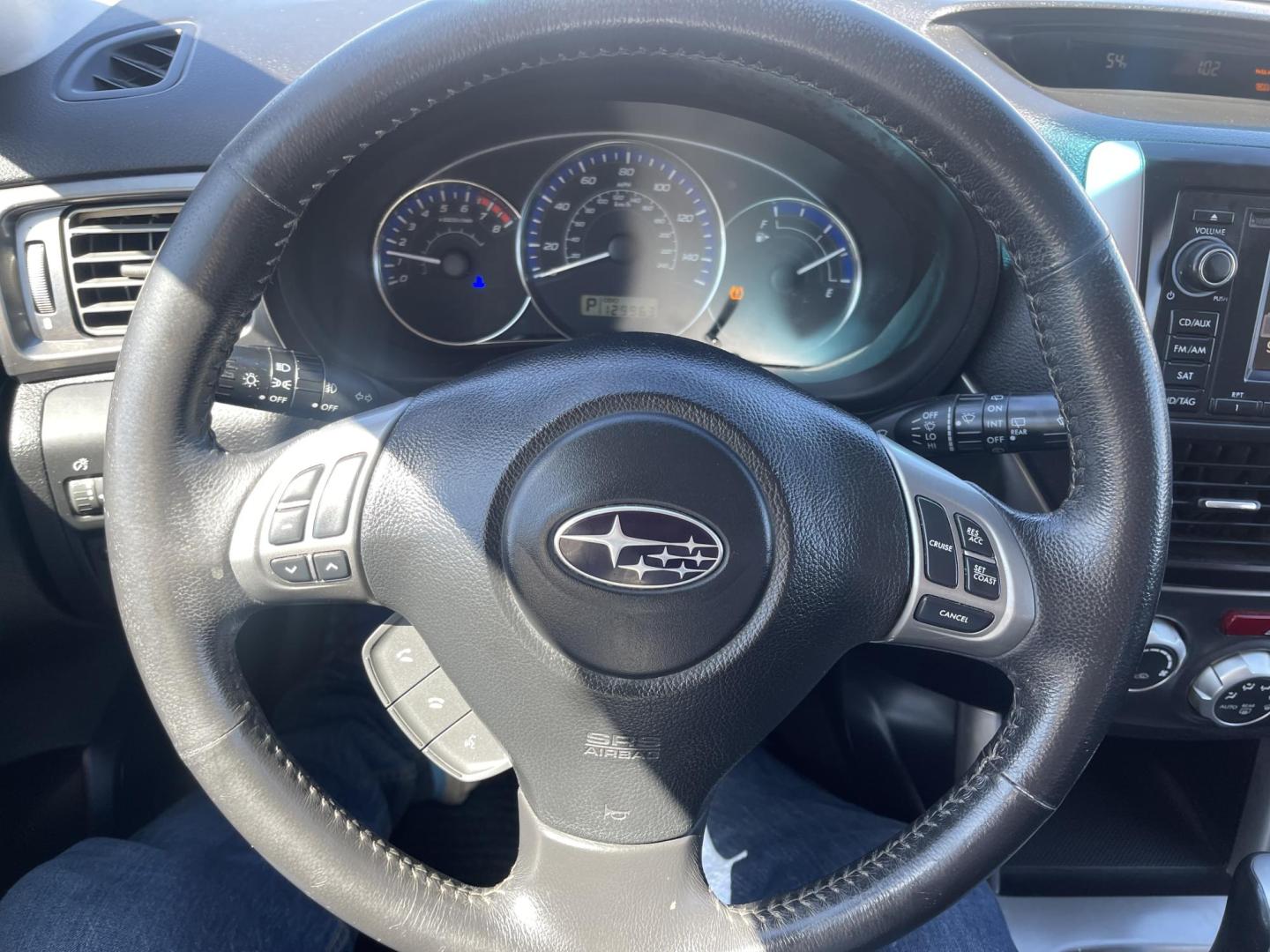 2011 Silver Sky Metallic /BLACK Subaru Forester 2.5X Limited (JF2SHAEC2BH) with an 2.5L H4 SOHC 16V engine, 4-Speed Automatic transmission, located at 801 South State Street, Salt Lake City, UT, 84111, (801) 328-0098, 40.751953, -111.888206 - Super clean Subaru inside and out looks immaculate this is a must see for anyone looking for a clean affordable Subaru! Clean title as reported by Carfax! From dry climate area no salt no rust has not been in the Utah snow yet!!! Features: 4WD/AWD, Leather Seats, Alloy Wheels, Panoramic Sunroof, B - Photo#21