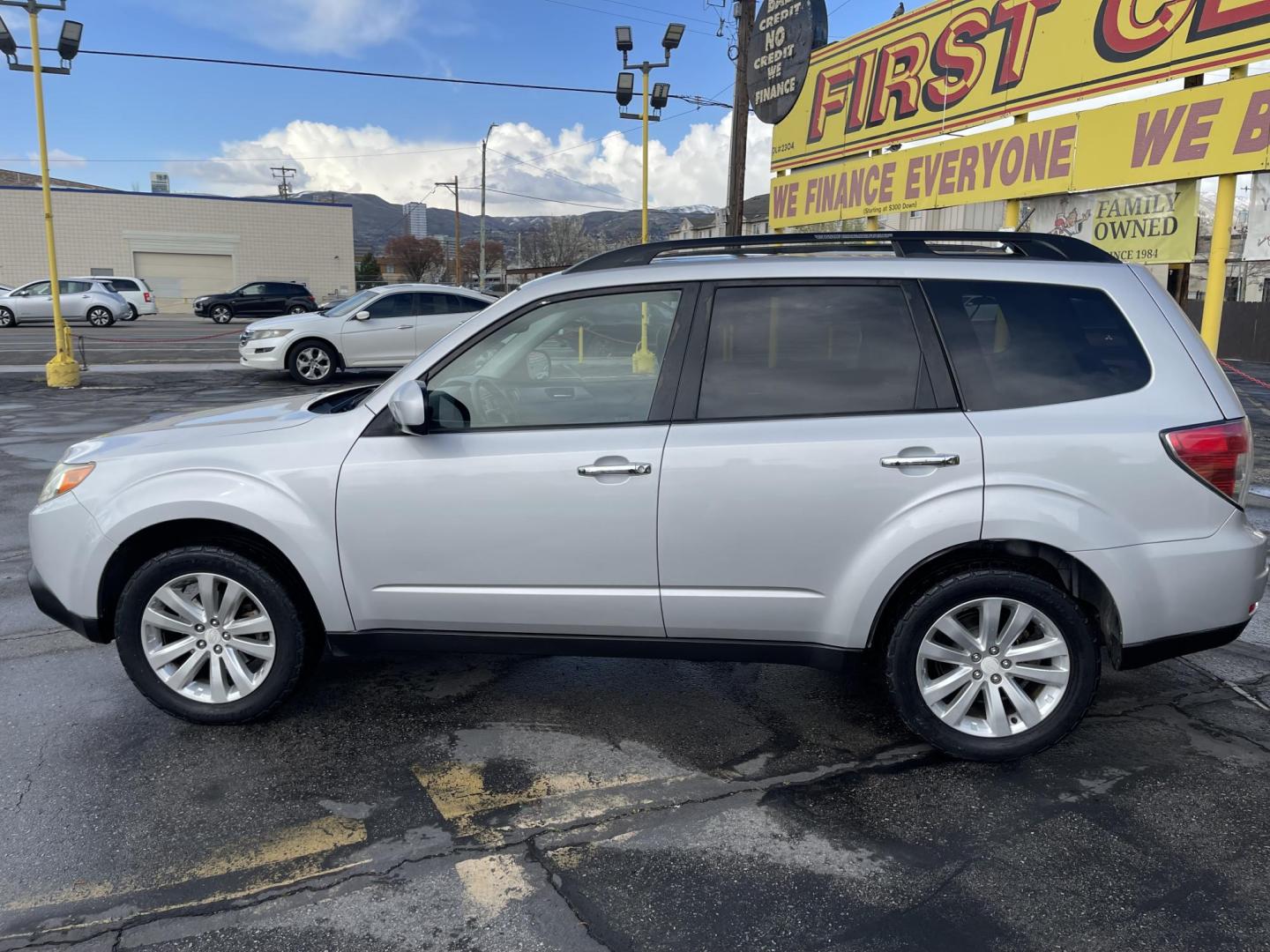 2011 Silver Sky Metallic /BLACK Subaru Forester 2.5X Limited (JF2SHAEC2BH) with an 2.5L H4 SOHC 16V engine, 4-Speed Automatic transmission, located at 801 South State Street, Salt Lake City, UT, 84111, (801) 328-0098, 40.751953, -111.888206 - Super clean Subaru inside and out looks immaculate this is a must see for anyone looking for a clean affordable Subaru! Clean title as reported by Carfax! From dry climate area no salt no rust has not been in the Utah snow yet!!! Features: 4WD/AWD, Leather Seats, Alloy Wheels, Panoramic Sunroof, B - Photo#9