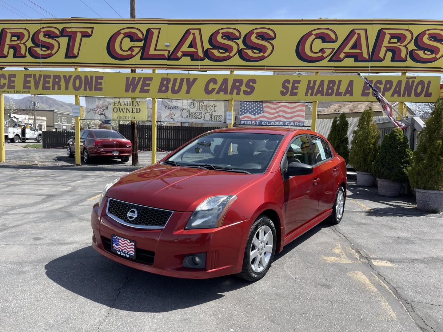 2011 Flame Red /Gray Nissan Sentra 2.0 (3N1AB6AP9BL) with an 2.0L L4 DOHC 16V engine, Continuously Variable Transmisson transmission, located at 801 South State Street, Salt Lake City, UT, 84111, (801) 328-0098, 40.751953, -111.888206 - Clean title! Low Miles! No accidents on the Carfax vehicle history report, Only 99k miles just over, good gas mileage! Perfect commuter car!!! Features: Alloy Wheels, Cloth Seats, ABS Brakes, Auxiliary Audio Input, Power Locks, Rear Spoiler, AM/FM Stereo, CD Audio, Power Mirrors, Side Airbags, Air - Photo#1