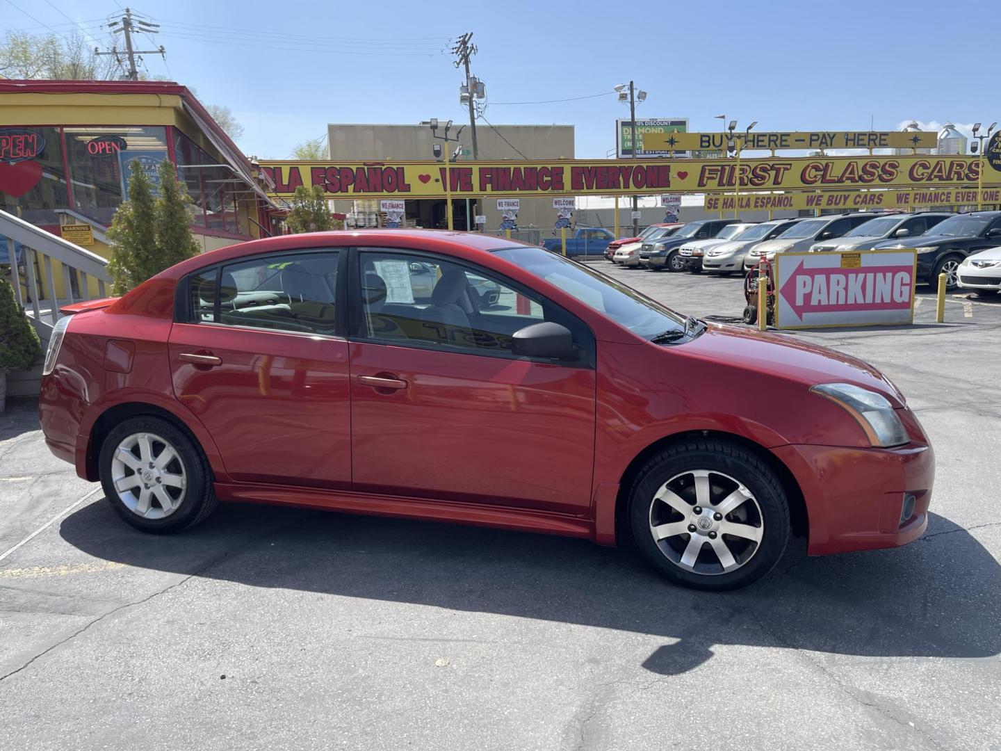 2011 Flame Red /Gray Nissan Sentra 2.0 (3N1AB6AP9BL) with an 2.0L L4 DOHC 16V engine, Continuously Variable Transmisson transmission, located at 801 South State Street, Salt Lake City, UT, 84111, (801) 328-0098, 40.751953, -111.888206 - Clean title! Low Miles! No accidents on the Carfax vehicle history report, Only 99k miles just over, good gas mileage! Perfect commuter car!!! Features: Alloy Wheels, Cloth Seats, ABS Brakes, Auxiliary Audio Input, Power Locks, Rear Spoiler, AM/FM Stereo, CD Audio, Power Mirrors, Side Airbags, Air - Photo#4
