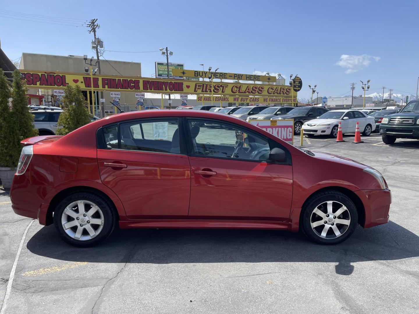 2011 Flame Red /Gray Nissan Sentra 2.0 (3N1AB6AP9BL) with an 2.0L L4 DOHC 16V engine, Continuously Variable Transmisson transmission, located at 801 South State Street, Salt Lake City, UT, 84111, (801) 328-0098, 40.751953, -111.888206 - Clean title! Low Miles! No accidents on the Carfax vehicle history report, Only 99k miles just over, good gas mileage! Perfect commuter car!!! Features: Alloy Wheels, Cloth Seats, ABS Brakes, Auxiliary Audio Input, Power Locks, Rear Spoiler, AM/FM Stereo, CD Audio, Power Mirrors, Side Airbags, Air - Photo#5