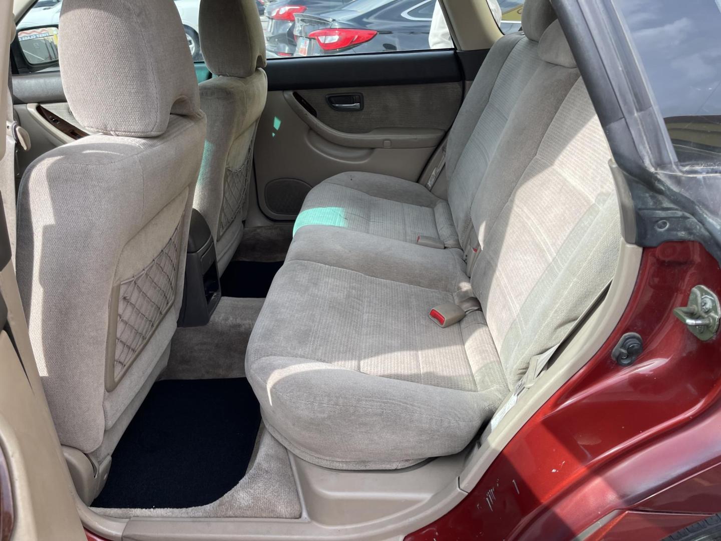 2003 Rallye Red /Tan Subaru Outback Wagon w/ All-weather Package (4S3BH675837) with an 2.5L H4 SOHC 16V engine, 4-Speed Automatic Overdrive transmission, located at 801 South State Street, Salt Lake City, UT, 84111, (801) 328-0098, 40.751953, -111.888206 - AWD! 2.5Liter 4 cylinder good on gas! Clean title! No accidents on Carfax, vehicle has a clean Carfax and has been meticulously maintained according to Carfax over 68 service records reported to Carfax that include maintenance, oil changes timing belt and several other records!!! Features: AWD, Pow - Photo#10