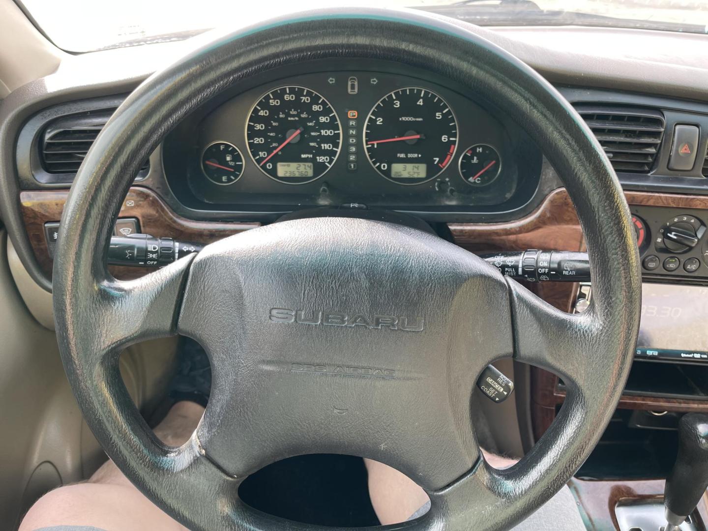 2003 Rallye Red /Tan Subaru Outback Wagon w/ All-weather Package (4S3BH675837) with an 2.5L H4 SOHC 16V engine, 4-Speed Automatic Overdrive transmission, located at 801 South State Street, Salt Lake City, UT, 84111, (801) 328-0098, 40.751953, -111.888206 - AWD! 2.5Liter 4 cylinder good on gas! Clean title! No accidents on Carfax, vehicle has a clean Carfax and has been meticulously maintained according to Carfax over 68 service records reported to Carfax that include maintenance, oil changes timing belt and several other records!!! Features: AWD, Pow - Photo#15