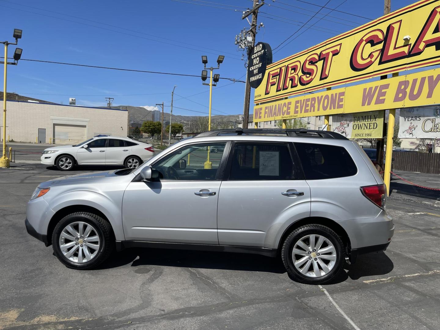 2011 Silver Sky Metallic /BLACK Subaru Forester 2.5X Limited (JF2SHBEC5BH) with an 2.5L H4 SOHC 16V engine, 4-Speed Automatic transmission, located at 801 South State Street, Salt Lake City, UT, 84111, (801) 328-0098, 40.751953, -111.888206 - Clean title! Only 1 owner on Carfax history report! Immaculate condition for the year, make and miles! Must see for anyone looking for a clean affordable car with all wheel drive! Good gas mileage great all year vehicle with AWD!!Features: 4WD/AWD, Panoramic Sunroof, Alloy Wheels, Rear View Camera, - Photo#9