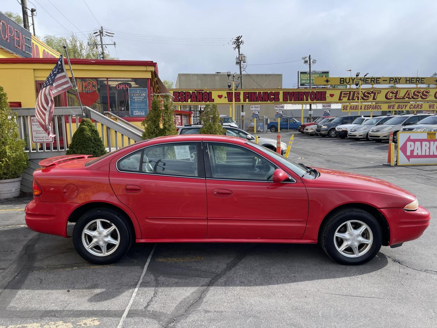 2000 Rallye Red /BROWN Oldsmobile Alero GL1 Sedan (1G3NL52T3YC) with an 2.4L L4 DOHC 16V engine, 5-Speed Manual Overdrive transmission, located at 801 South State Street, Salt Lake City, UT, 84111, (801) 328-0098, 40.751953, -111.888206 - Features: Automatic, power locks, power windows, power seat, alloy wheels, am/fm/cd, cloth interior, 4 cylinder 2.4 liter motor, electronic defrost, * All advertised prices are just dollars above cost to make room for new inventory these are our cash prices plus taxes, licensing and dealer fees. A - Photo#4