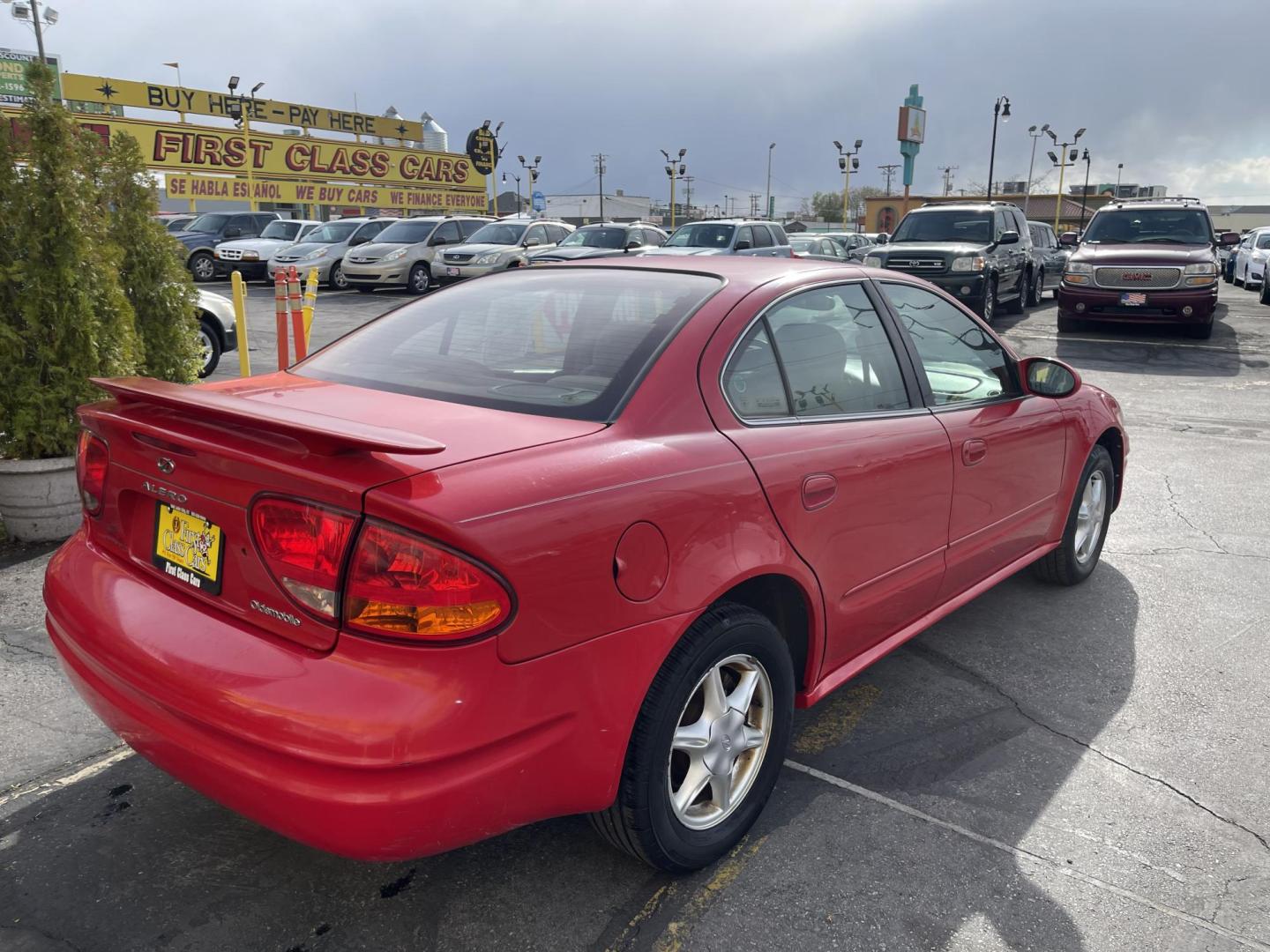 2000 Rallye Red /BROWN Oldsmobile Alero GL1 Sedan (1G3NL52T3YC) with an 2.4L L4 DOHC 16V engine, 5-Speed Manual Overdrive transmission, located at 801 South State Street, Salt Lake City, UT, 84111, (801) 328-0098, 40.751953, -111.888206 - Features: Automatic, power locks, power windows, power seat, alloy wheels, am/fm/cd, cloth interior, 4 cylinder 2.4 liter motor, electronic defrost, * All advertised prices are just dollars above cost to make room for new inventory these are our cash prices plus taxes, licensing and dealer fees. A - Photo#5