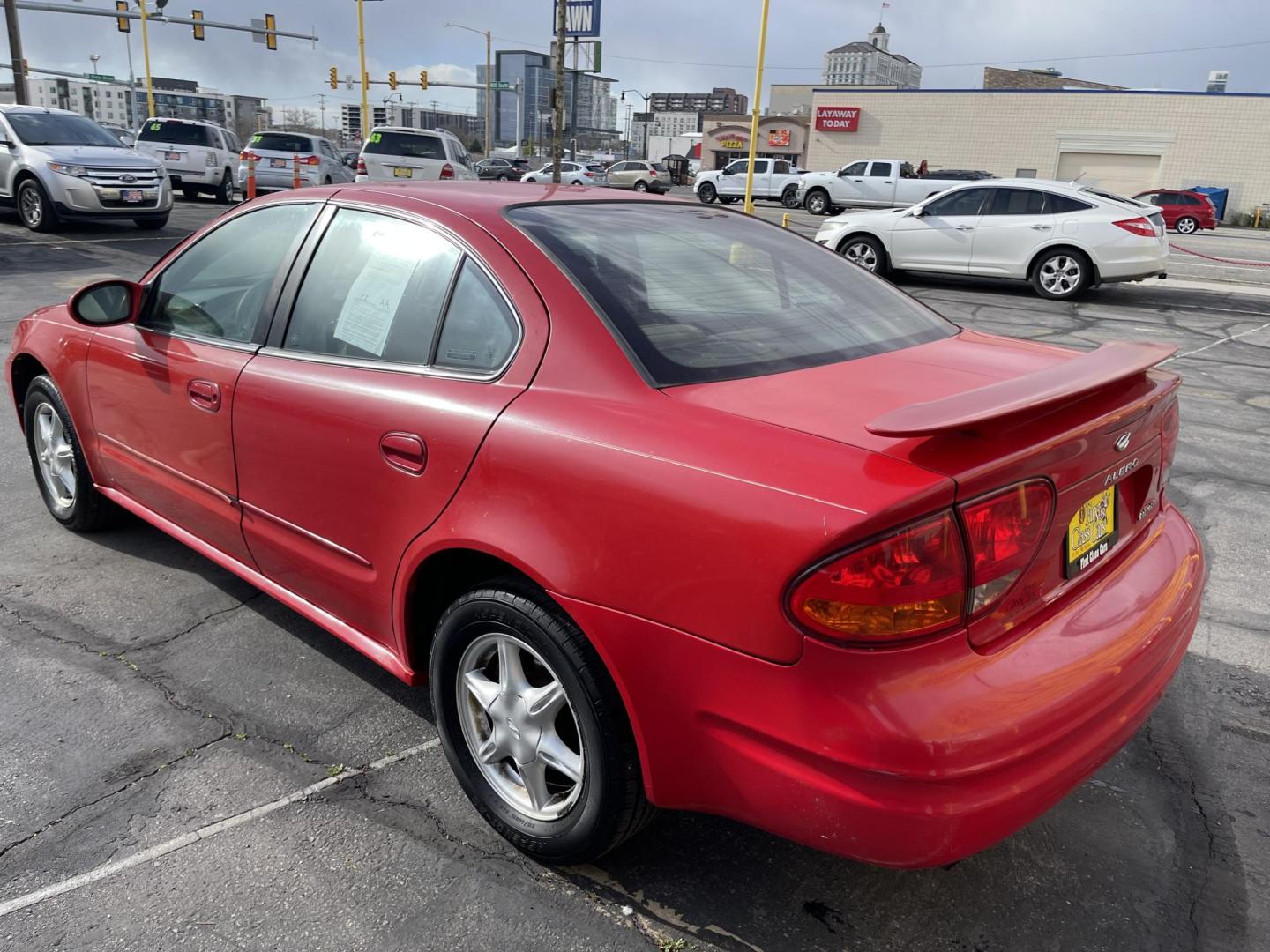 2000 Rallye Red /BROWN Oldsmobile Alero GL1 Sedan (1G3NL52T3YC) with an 2.4L L4 DOHC 16V engine, 5-Speed Manual Overdrive transmission, located at 801 South State Street, Salt Lake City, UT, 84111, (801) 328-0098, 40.751953, -111.888206 - Features: Automatic, power locks, power windows, power seat, alloy wheels, am/fm/cd, cloth interior, 4 cylinder 2.4 liter motor, electronic defrost, * All advertised prices are just dollars above cost to make room for new inventory these are our cash prices plus taxes, licensing and dealer fees. A - Photo#7