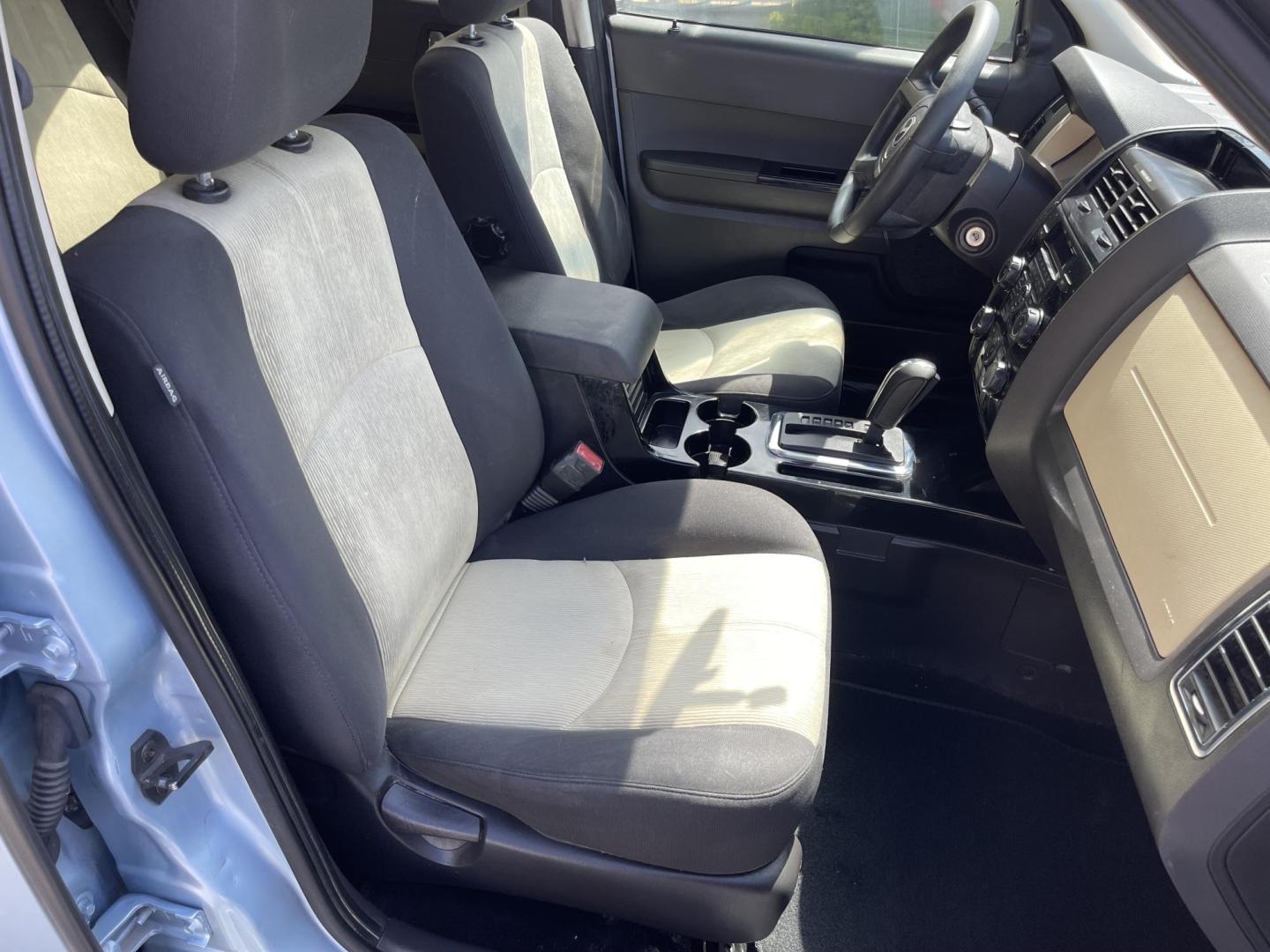 2008 Blue /Tan Mazda Tribute i Grand Touring FWD (4F2CZ02Z38K) with an 2.3L L4 DOHC 24V engine, 4-Speed Automatic Overdrive transmission, located at 801 South State Street, Salt Lake City, UT, 84111, (801) 328-0098, 40.751953, -111.888206 - Clean title! No reported accidents on Carfax history report only 3 previous owners!!! Features: Alloy Wheels, Cloth Seats, Sport Package, ABS Brakes, Auxiliary Audio Input, Power Locks, Side Airbags, AM/FM Stereo, CD Audio, Power Mirrors, Traction Control, Air Conditioning, Full Roof Rack, Power W - Photo#13