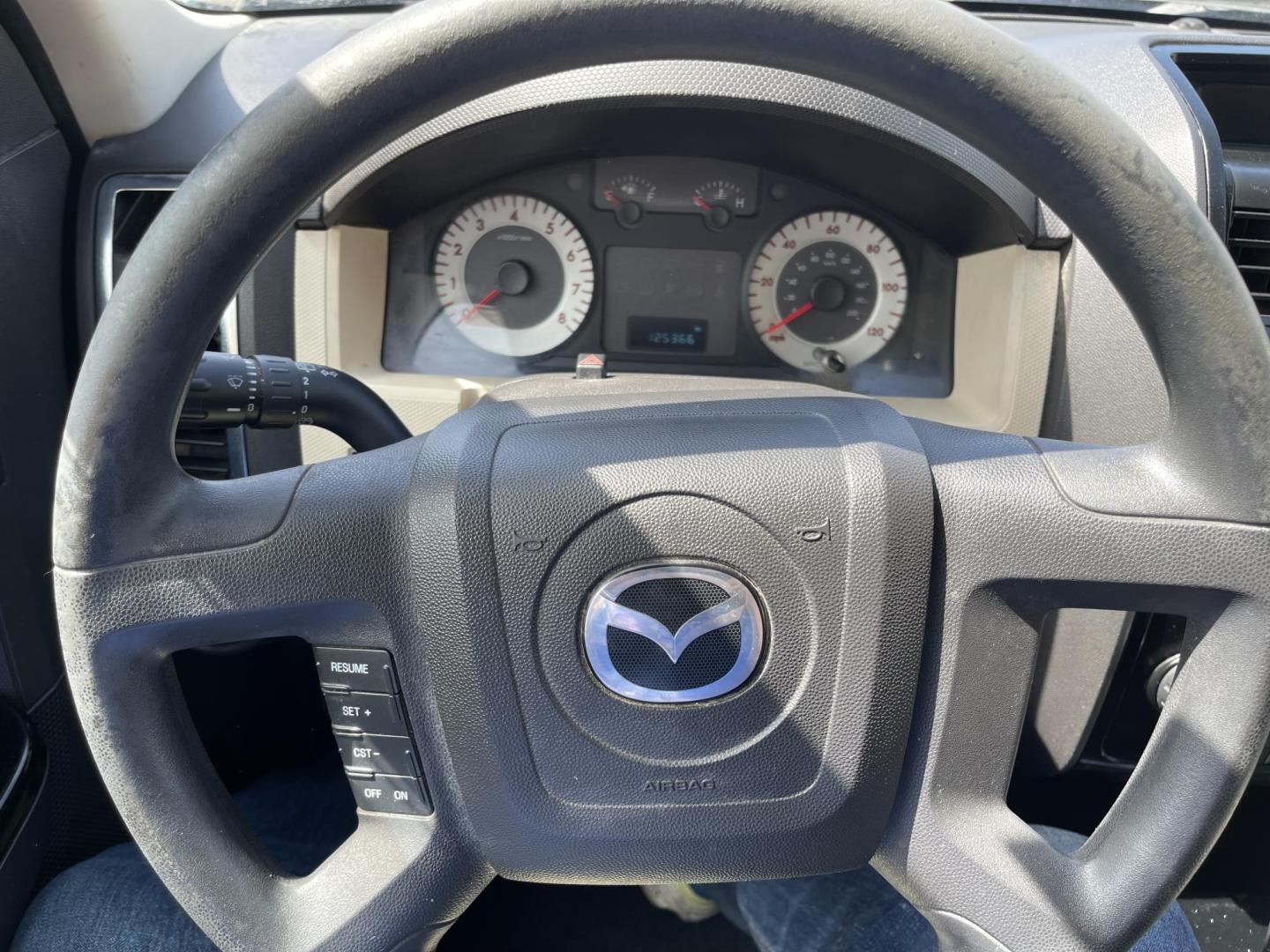 2008 Blue /Tan Mazda Tribute i Grand Touring FWD (4F2CZ02Z38K) with an 2.3L L4 DOHC 24V engine, 4-Speed Automatic Overdrive transmission, located at 801 South State Street, Salt Lake City, UT, 84111, (801) 328-0098, 40.751953, -111.888206 - Clean title! No reported accidents on Carfax history report only 3 previous owners!!! Features: Alloy Wheels, Cloth Seats, Sport Package, ABS Brakes, Auxiliary Audio Input, Power Locks, Side Airbags, AM/FM Stereo, CD Audio, Power Mirrors, Traction Control, Air Conditioning, Full Roof Rack, Power W - Photo#16