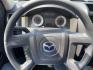 2008 Blue /Tan Mazda Tribute i Grand Touring FWD (4F2CZ02Z38K) with an 2.3L L4 DOHC 24V engine, 4-Speed Automatic Overdrive transmission, located at 801 South State Street, Salt Lake City, UT, 84111, (801) 328-0098, 40.751953, -111.888206 - Clean title! No reported accidents on Carfax history report only 3 previous owners!!! Features: Alloy Wheels, Cloth Seats, Sport Package, ABS Brakes, Auxiliary Audio Input, Power Locks, Side Airbags, AM/FM Stereo, CD Audio, Power Mirrors, Traction Control, Air Conditioning, Full Roof Rack, Power W - Photo#16