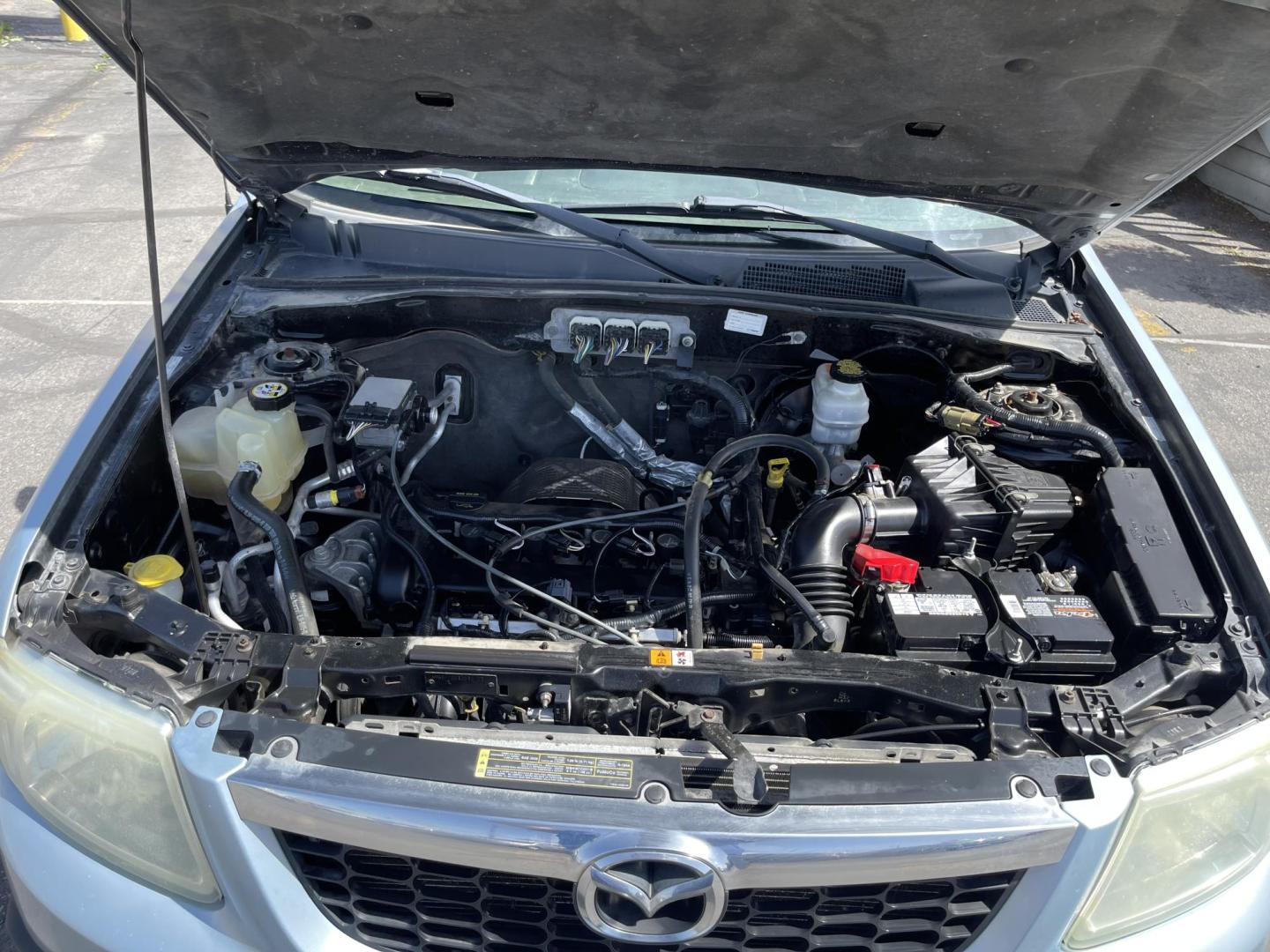 2008 Blue /Tan Mazda Tribute i Grand Touring FWD (4F2CZ02Z38K) with an 2.3L L4 DOHC 24V engine, 4-Speed Automatic Overdrive transmission, located at 801 South State Street, Salt Lake City, UT, 84111, (801) 328-0098, 40.751953, -111.888206 - Clean title! No reported accidents on Carfax history report only 3 previous owners!!! Features: Alloy Wheels, Cloth Seats, Sport Package, ABS Brakes, Auxiliary Audio Input, Power Locks, Side Airbags, AM/FM Stereo, CD Audio, Power Mirrors, Traction Control, Air Conditioning, Full Roof Rack, Power W - Photo#19
