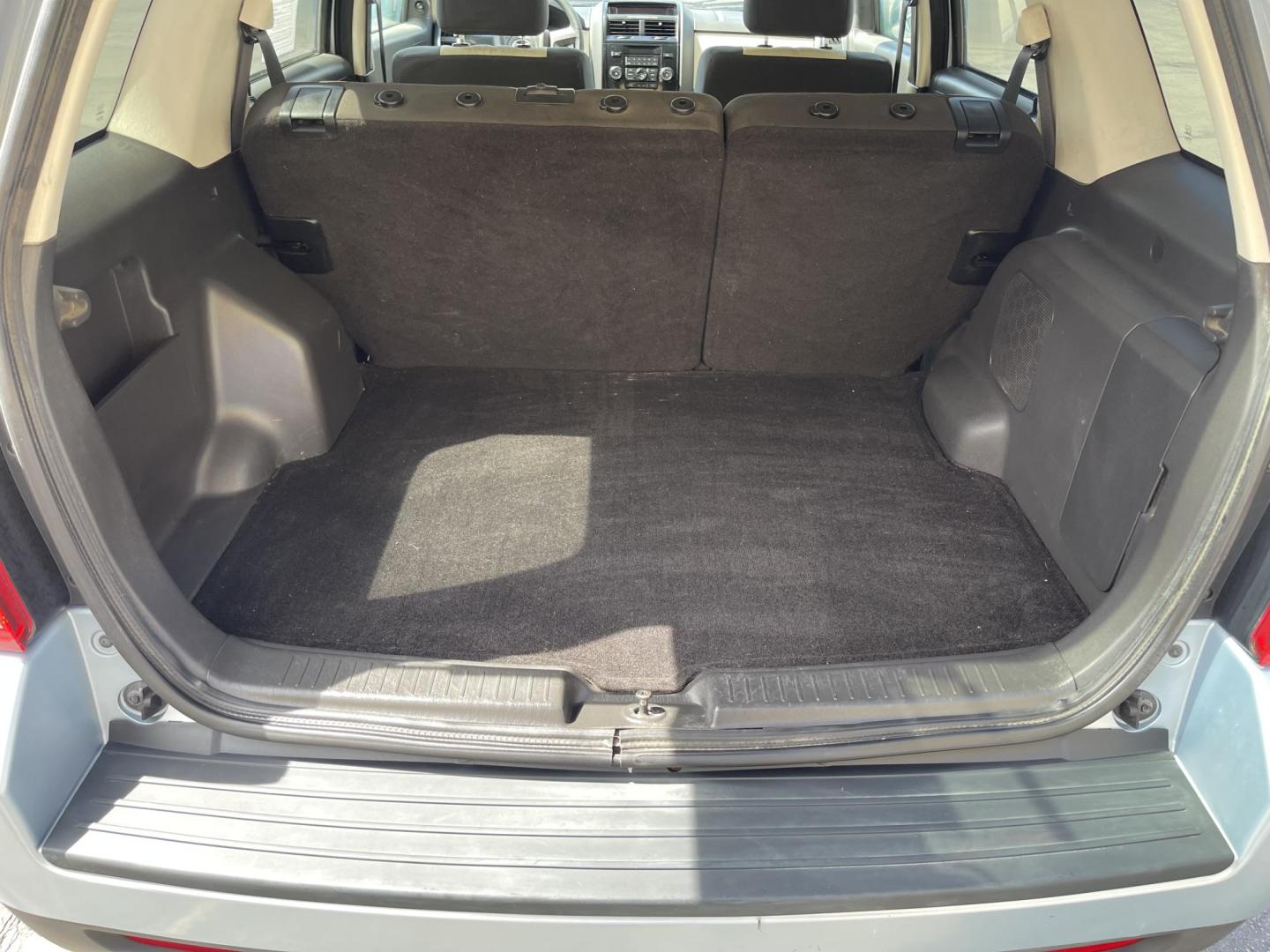 2008 Blue /Tan Mazda Tribute i Grand Touring FWD (4F2CZ02Z38K) with an 2.3L L4 DOHC 24V engine, 4-Speed Automatic Overdrive transmission, located at 801 South State Street, Salt Lake City, UT, 84111, (801) 328-0098, 40.751953, -111.888206 - Clean title! No reported accidents on Carfax history report only 3 previous owners!!! Features: Alloy Wheels, Cloth Seats, Sport Package, ABS Brakes, Auxiliary Audio Input, Power Locks, Side Airbags, AM/FM Stereo, CD Audio, Power Mirrors, Traction Control, Air Conditioning, Full Roof Rack, Power W - Photo#21