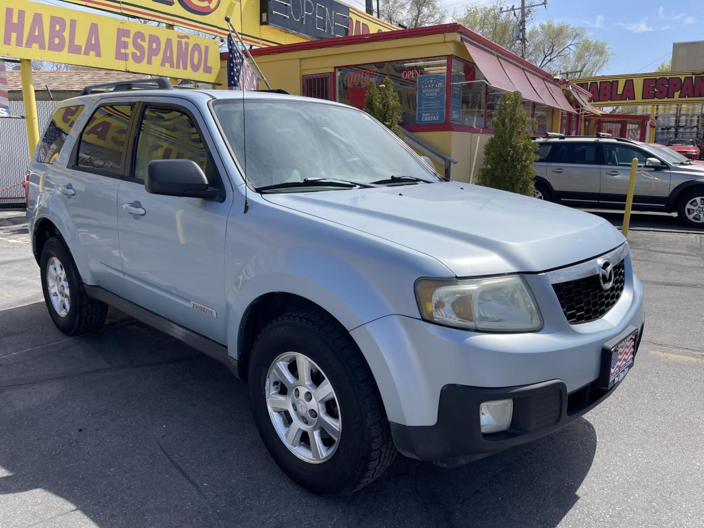 2008 Blue /Tan Mazda Tribute i Grand Touring FWD (4F2CZ02Z38K) with an 2.3L L4 DOHC 24V engine, 4-Speed Automatic Overdrive transmission, located at 801 South State Street, Salt Lake City, UT, 84111, (801) 328-0098, 40.751953, -111.888206 - Clean title! No reported accidents on Carfax history report only 3 previous owners!!! Features: Alloy Wheels, Cloth Seats, Sport Package, ABS Brakes, Auxiliary Audio Input, Power Locks, Side Airbags, AM/FM Stereo, CD Audio, Power Mirrors, Traction Control, Air Conditioning, Full Roof Rack, Power W - Photo#3
