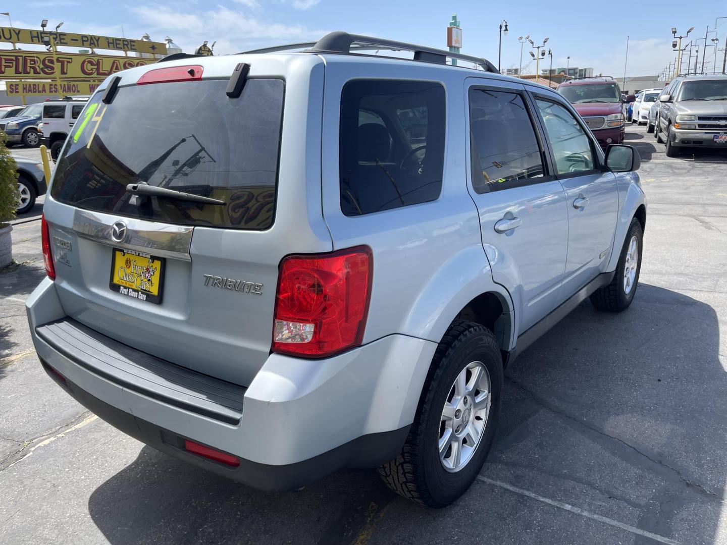 2008 Blue /Tan Mazda Tribute i Grand Touring FWD (4F2CZ02Z38K) with an 2.3L L4 DOHC 24V engine, 4-Speed Automatic Overdrive transmission, located at 801 South State Street, Salt Lake City, UT, 84111, (801) 328-0098, 40.751953, -111.888206 - Clean title! No reported accidents on Carfax history report only 3 previous owners!!! Features: Alloy Wheels, Cloth Seats, Sport Package, ABS Brakes, Auxiliary Audio Input, Power Locks, Side Airbags, AM/FM Stereo, CD Audio, Power Mirrors, Traction Control, Air Conditioning, Full Roof Rack, Power W - Photo#5