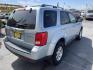 2008 Blue /Tan Mazda Tribute i Grand Touring FWD (4F2CZ02Z38K) with an 2.3L L4 DOHC 24V engine, 4-Speed Automatic Overdrive transmission, located at 801 South State Street, Salt Lake City, UT, 84111, (801) 328-0098, 40.751953, -111.888206 - Clean title! No reported accidents on Carfax history report only 3 previous owners!!! Features: Alloy Wheels, Cloth Seats, Sport Package, ABS Brakes, Auxiliary Audio Input, Power Locks, Side Airbags, AM/FM Stereo, CD Audio, Power Mirrors, Traction Control, Air Conditioning, Full Roof Rack, Power W - Photo#5